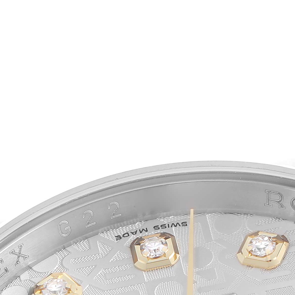The image shows a close-up of the Rolex Datejust 116233 Men's Steel and Gold (two tone) Silver Dial 116233 Men's Steel and Gold (two tone) Silver Dial dial, highlighting diamond hour markers and part of the edge.