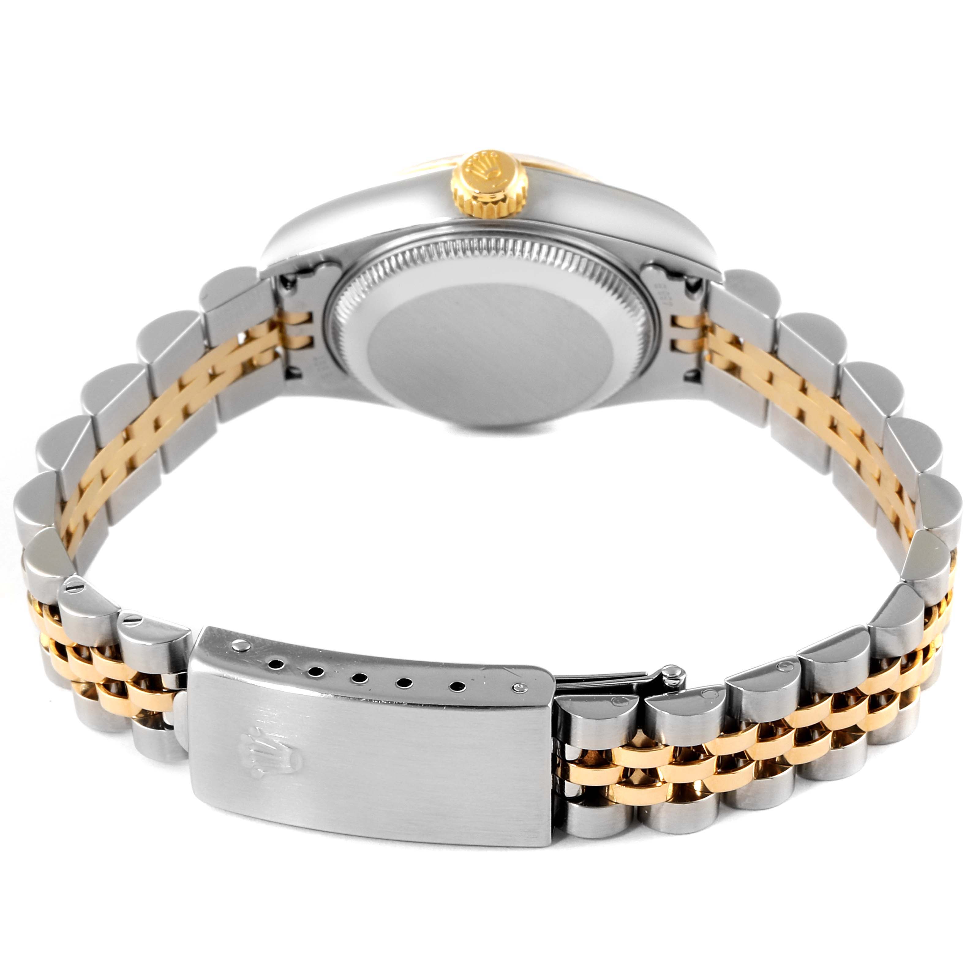 The image shows the Rolex Datejust 79173 Women's Steel and Gold (two tone) Black Dial 79173 Women's Steel and Gold (two tone) Black Dial watch from the back at an angle, featuring the watch bracelet and case back.