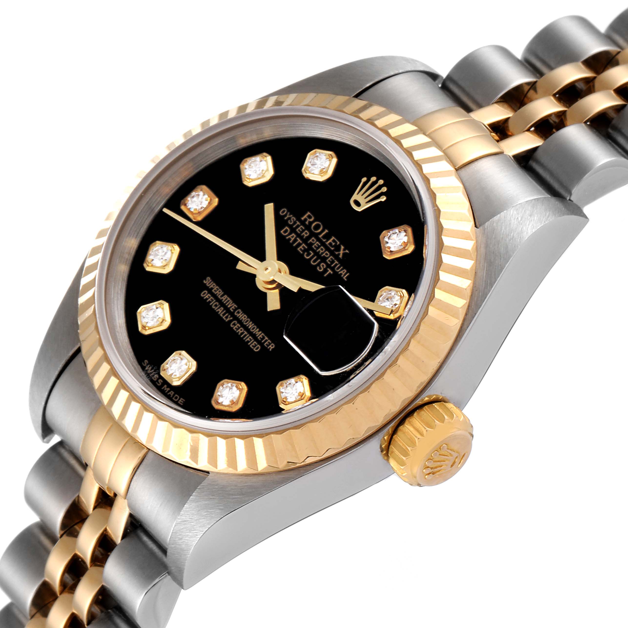 The image shows a close-up side angle of a Rolex Datejust 79173 Women's Steel and Gold (two tone) Black Dial 79173 Women's Steel and Gold (two tone) Black Dial watch, highlighting its black dial, fluted bezel, and two-tone bracelet.