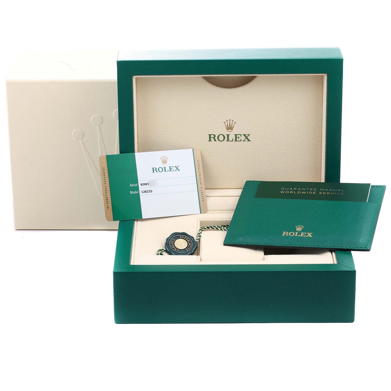 The image shows the open green box of the Rolex Datejust 126233 Men's Steel and Gold (two tone) Silver Dial 126233 Men's Steel and Gold (two tone) Silver Dial model with a guarantee manual, serial/model card, and a green tag.