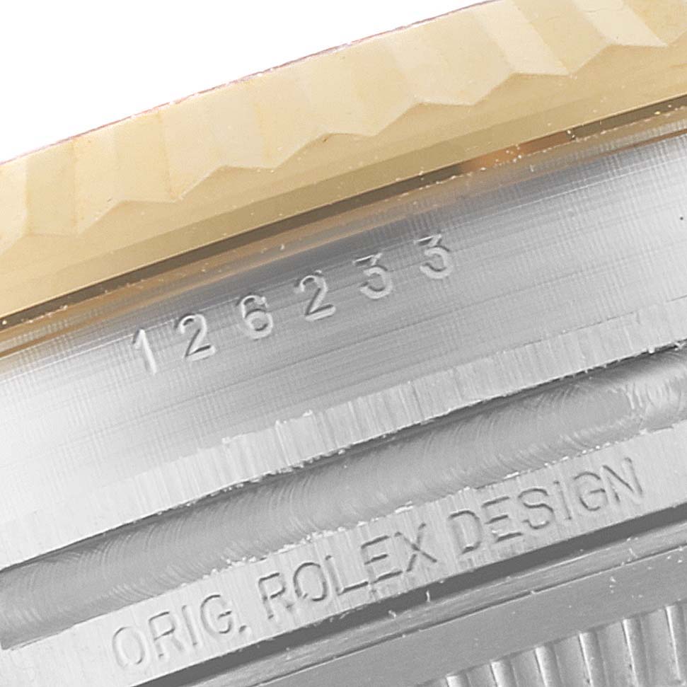 The image shows a close-up of the bezel and case of a Rolex Datejust 126233 Men's Steel and Gold (two tone) Silver Dial 126233 Men's Steel and Gold (two tone) Silver Dial, featuring the model number and "ORIG. ROLEX DESIGN" engraving.