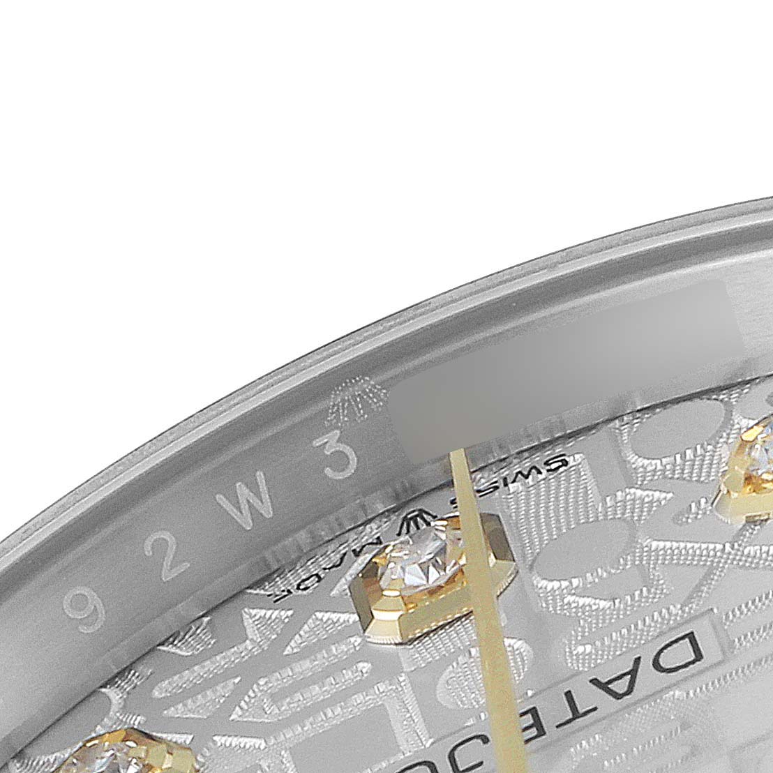 This image shows a close-up of the dial and diamond markers of a Rolex Datejust 126233 Men's Steel and Gold (two tone) Silver Dial 126233 Men's Steel and Gold (two tone) Silver Dial watch.