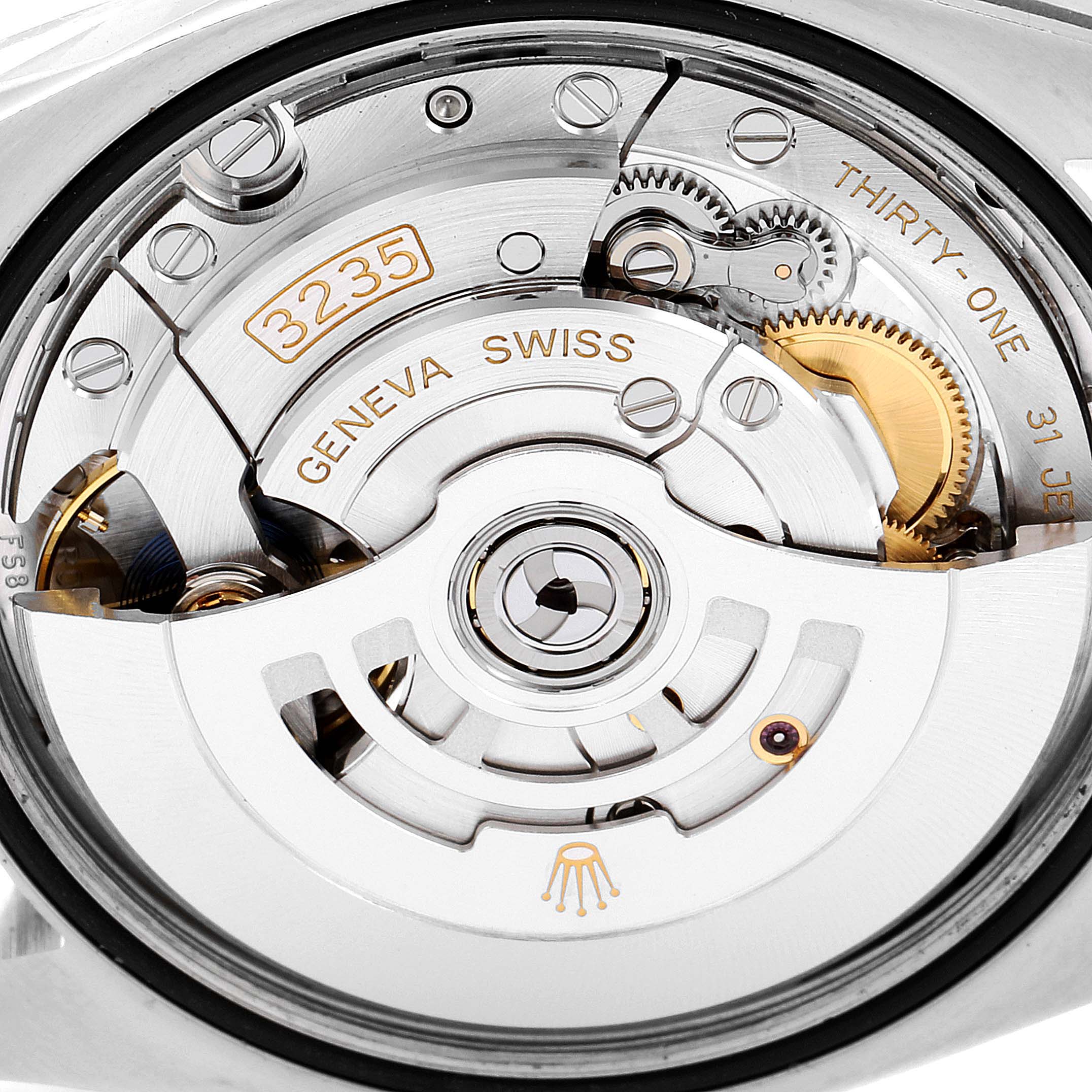 This image shows a close-up of the movement mechanism of a Rolex Datejust 126233 Men's Steel and Gold (two tone) Silver Dial 126233 Men's Steel and Gold (two tone) Silver Dial watch, Model 3235, from the back.