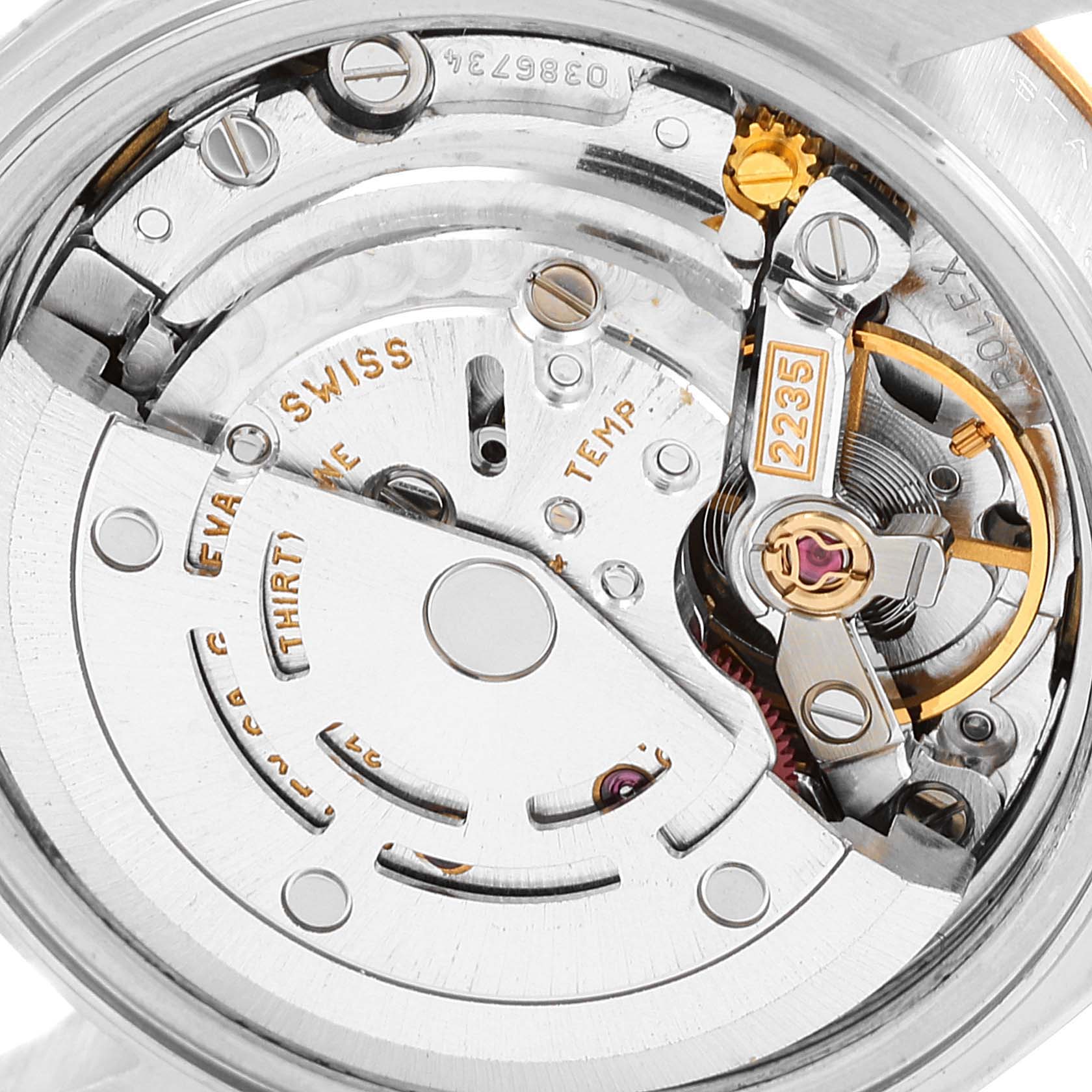 This is a close-up view of the Rolex Datejust 79173 Women's Steel and Gold (two tone) Mother of Pearl Dial 79173 Women's Steel and Gold (two tone) Mother of Pearl Dial watch movement, showing intricate internal components.