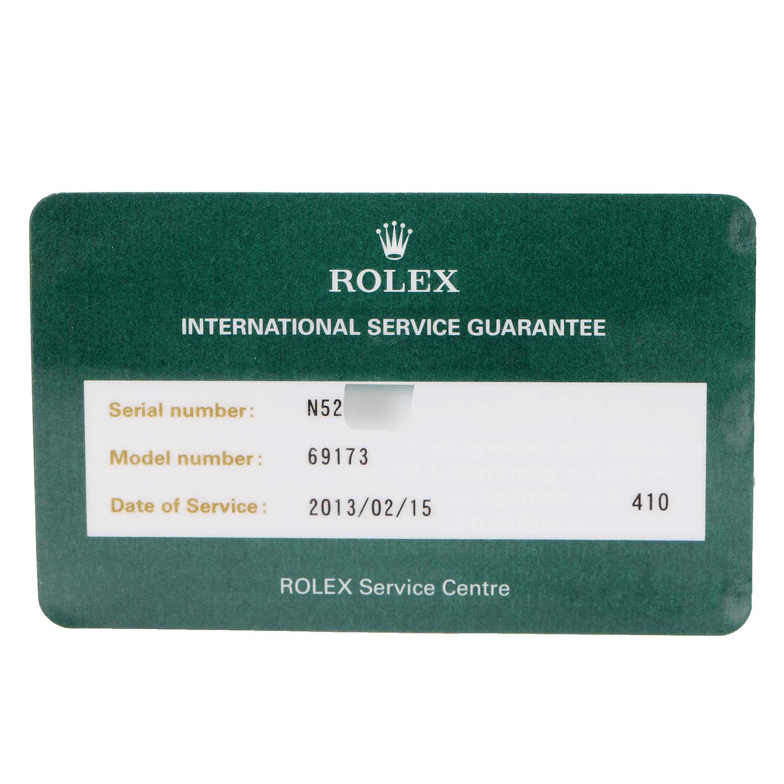 The image shows the front of a Rolex Datejust 69173 Women
s Steel and Gold (two tone) White Dial 69173 Women
s Steel and Gold (two tone) White Dial International Service Guarantee card.