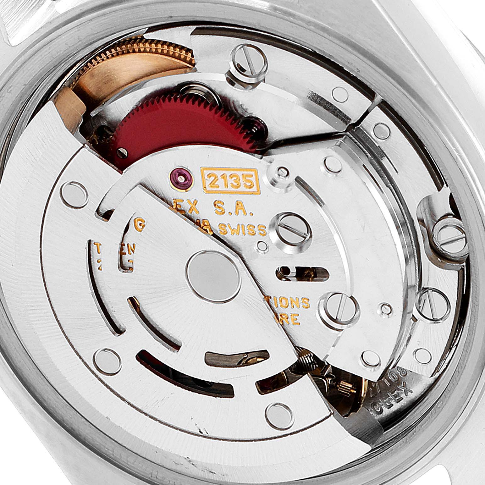 Close-up of the Rolex Datejust 69173 Women's Steel and Gold (two tone) White Dial 69173 Women's Steel and Gold (two tone) White Dial watch's movement, showing intricate gears and components from a top-angle view.