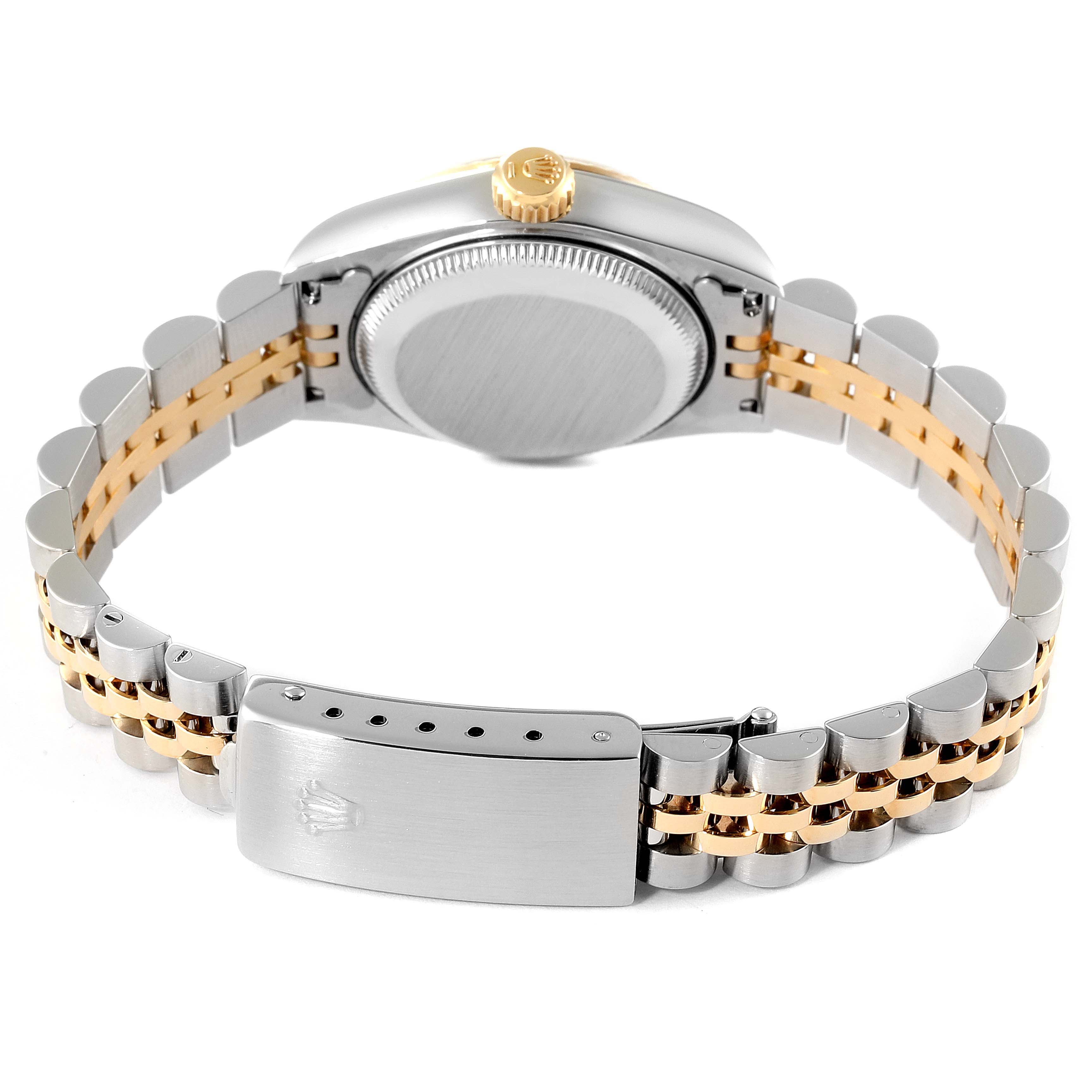 The image shows the back view of a Rolex Datejust 69173 Women's Steel and Gold (two tone) White Dial 69173 Women's Steel and Gold (two tone) White Dial watch, highlighting the case, crown, and two-tone bracelet with clasp.