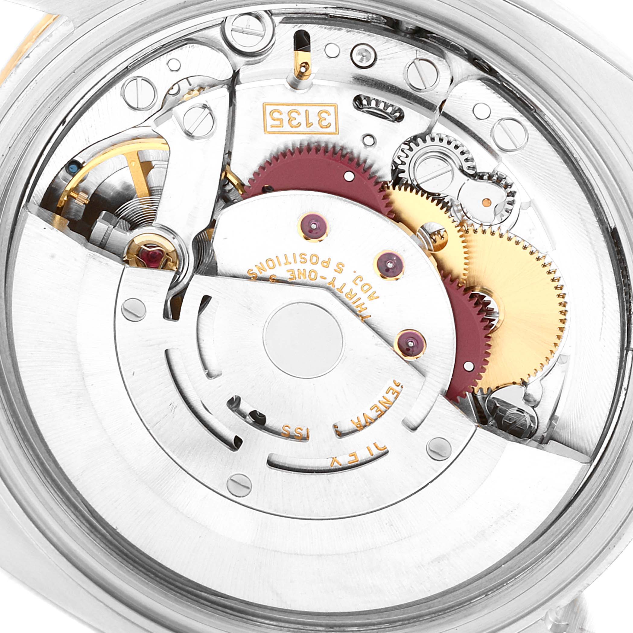 This image shows a close-up of the inner mechanical movement of the Rolex Turn-o-Graph 43821 Men's Steel and Gold (two tone) White Dial 43821 Men's Steel and Gold (two tone) White Dial watch.