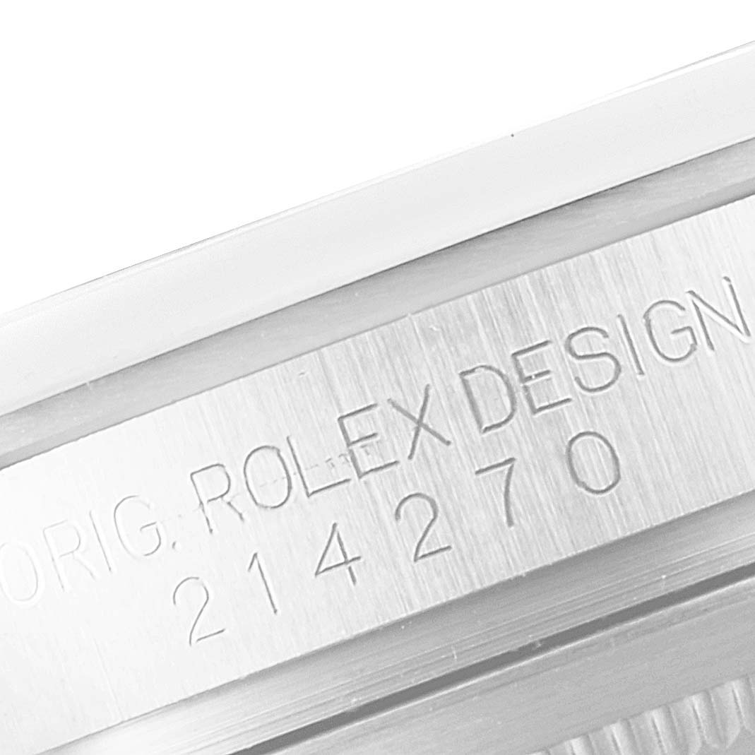 This image shows a close-up of the engraved side of a Rolex Explorer 214270 Men's Stainless Steel Black Dial 214270 Men's Stainless Steel Black Dial watch, displaying the model number 214270.