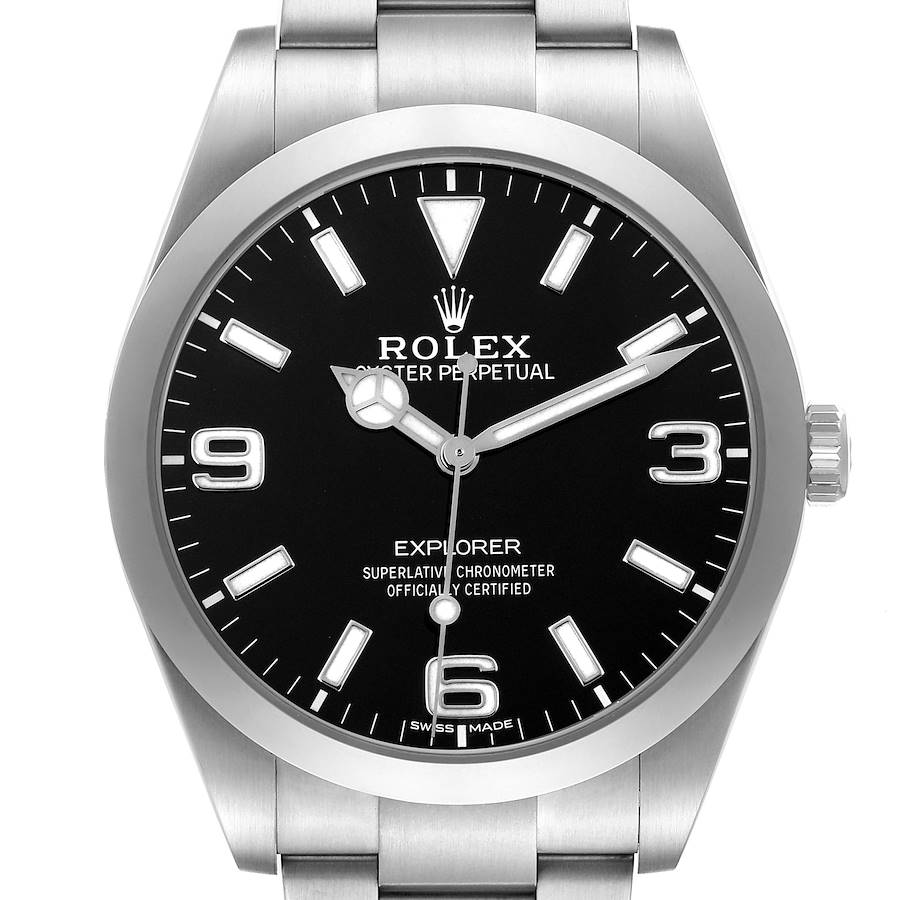 The Rolex Explorer watch is shown from the front, displaying the dial, hands, and part of the bracelet.