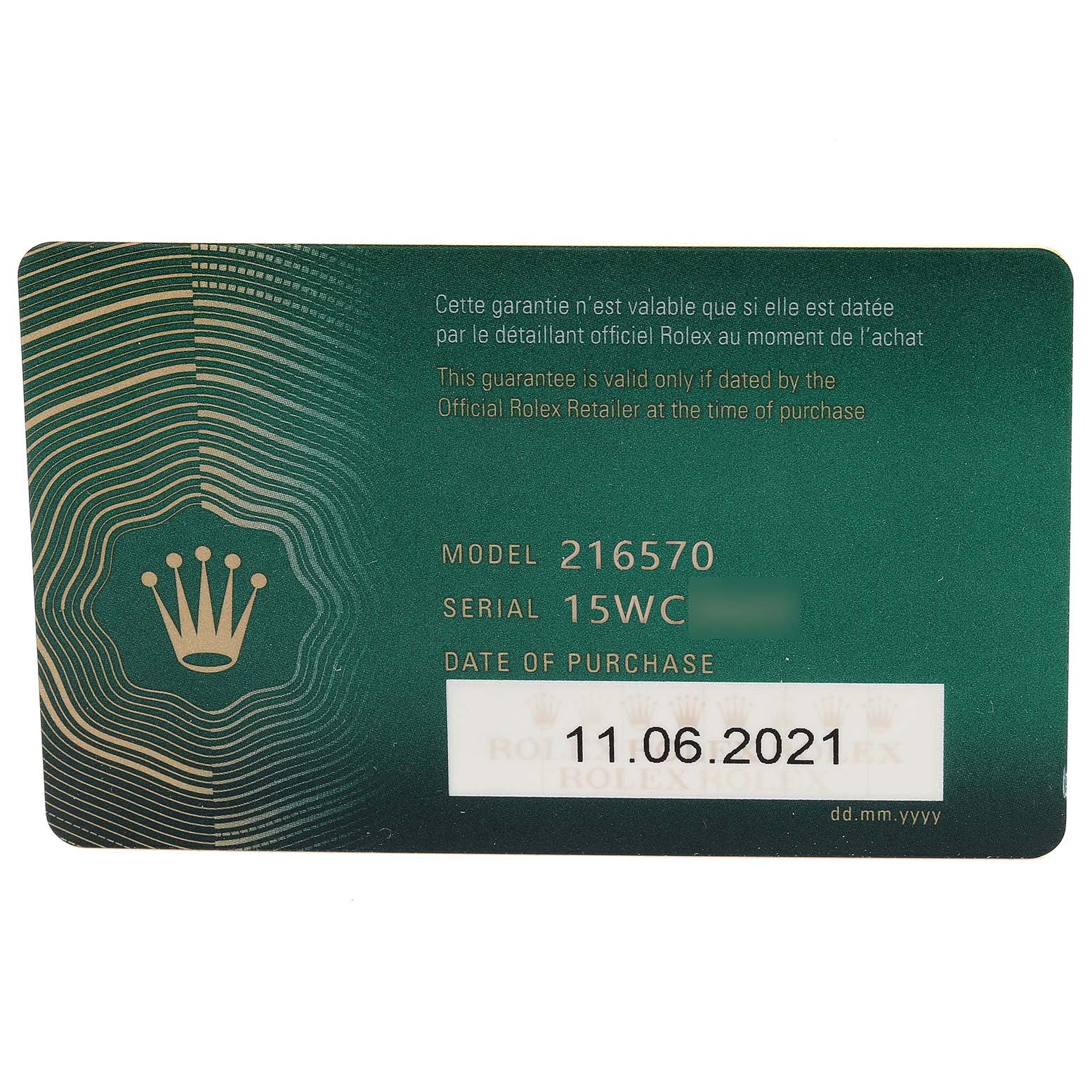 This image shows a green Rolex guarantee card for the Explorer model 216570, including the serial number and date of purchase.
