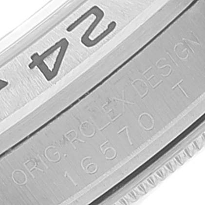 The image shows the side view of the case of a Rolex Explorer 16570 Men's Stainless Steel Black Dial 16570 Men's Stainless Steel Black Dial model, displaying the engraved serial and model numbers.