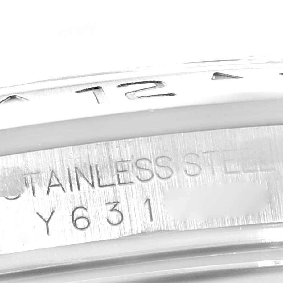 This image shows a close-up of the stainless steel engraved case back and serial number of a Rolex Explorer 16570 Men
s Stainless Steel Black Dial 16570 Men
s Stainless Steel Black Dial watch.