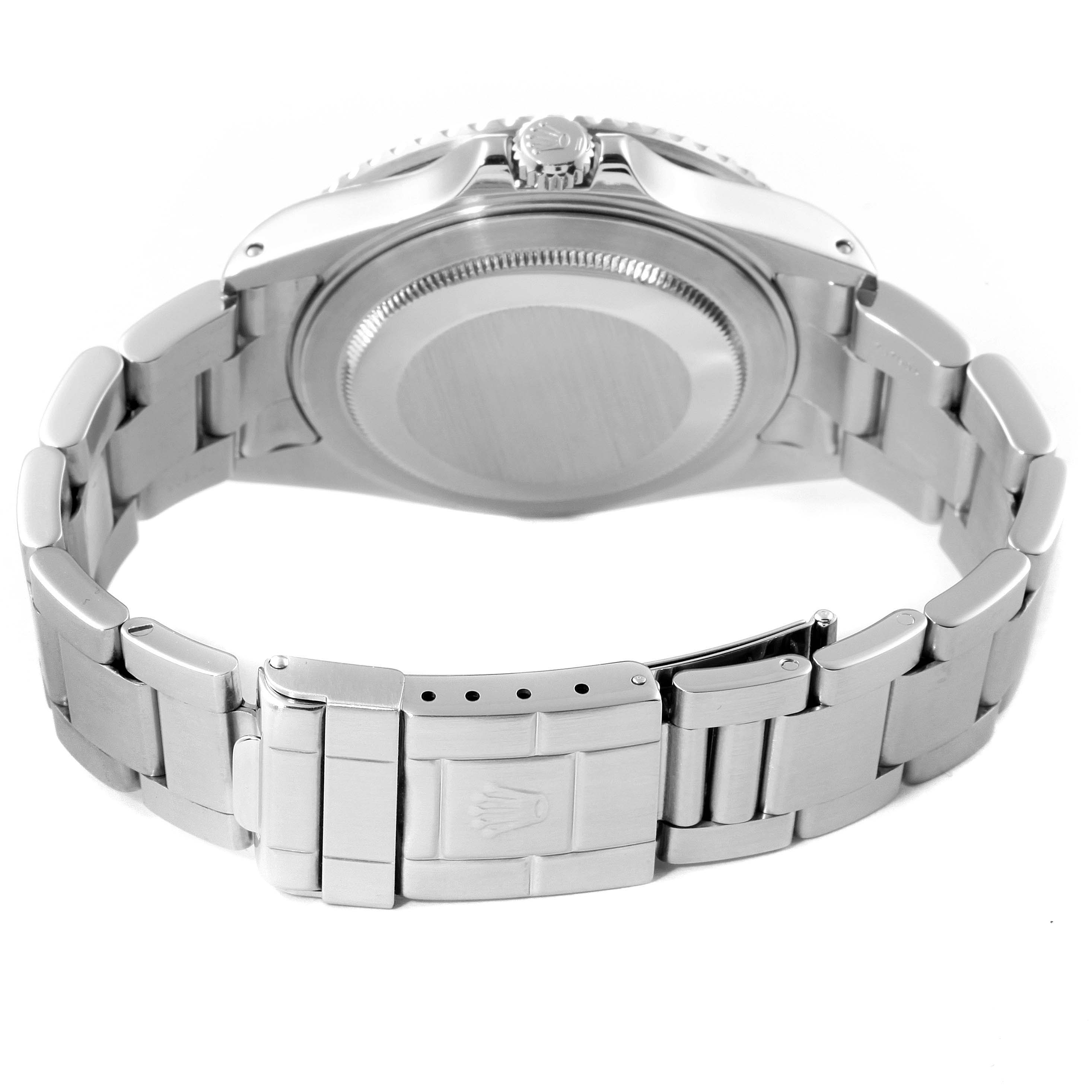 The image shows the back view of a Rolex GMT-Master 16710 Men
s Stainless Steel Black Dial 16710 Men
s Stainless Steel Black Dial watch, highlighting the case back and bracelet clasp.