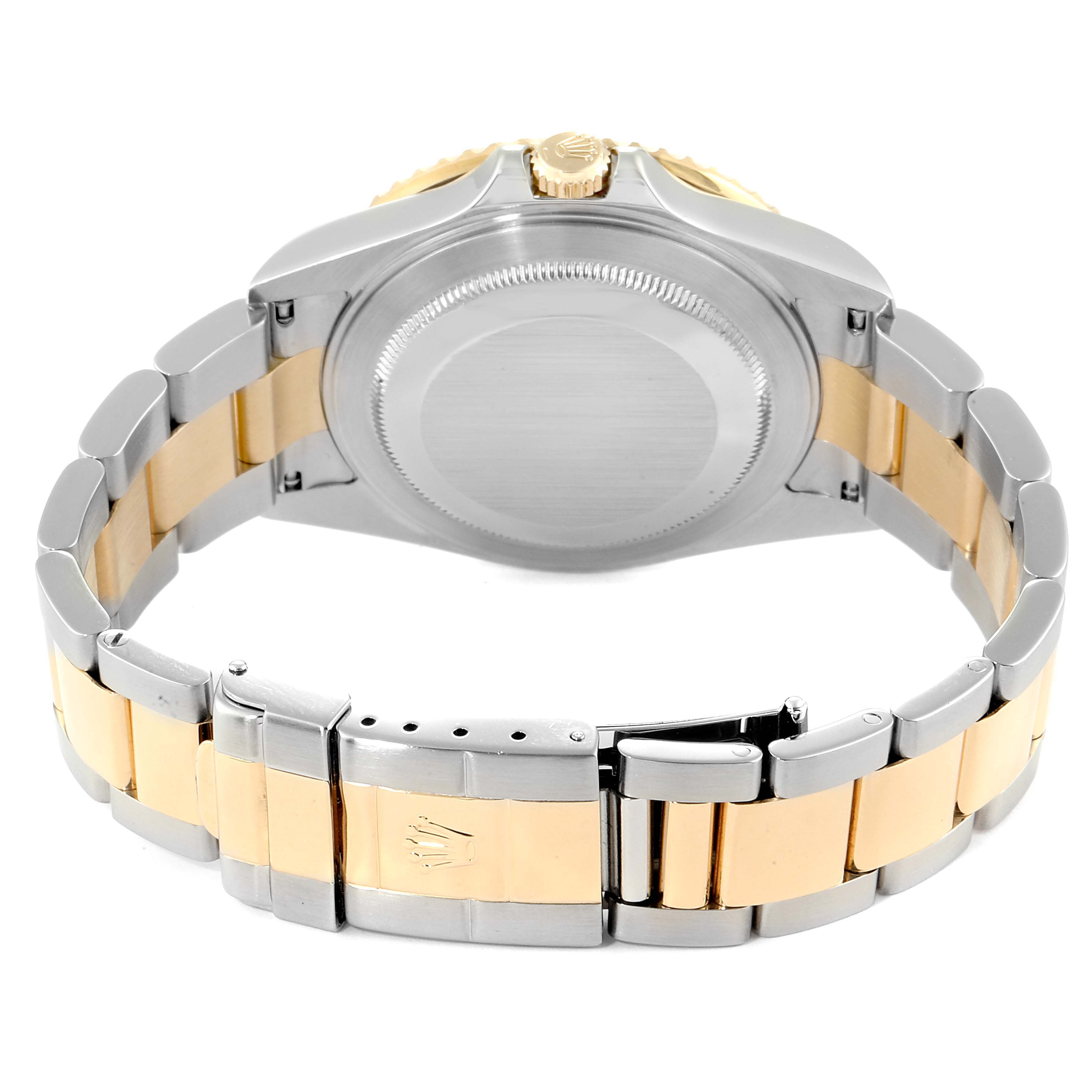 The image shows the back case and bracelet of a Rolex GMT-Master 16713 Men's Steel and Gold (two tone) Black Dial 16713 Men's Steel and Gold (two tone) Black Dial watch, highlighting the two-tone metal design.