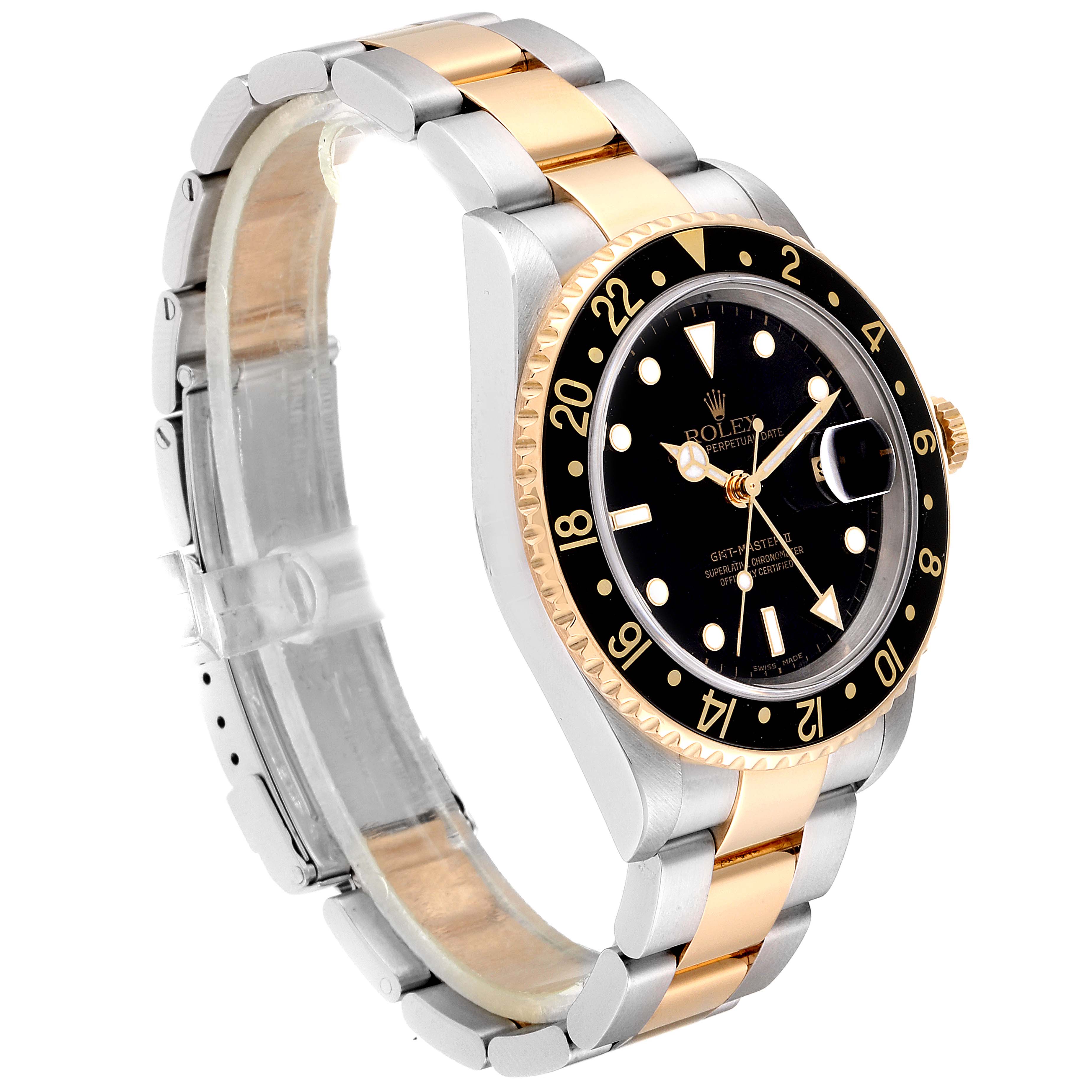 The Rolex GMT-Master 16713 Men's Steel and Gold (two tone) Black Dial 16713 Men's Steel and Gold (two tone) Black Dial watch is shown at a slight angle, highlighting the dial, bezel, and two-tone bracelet.