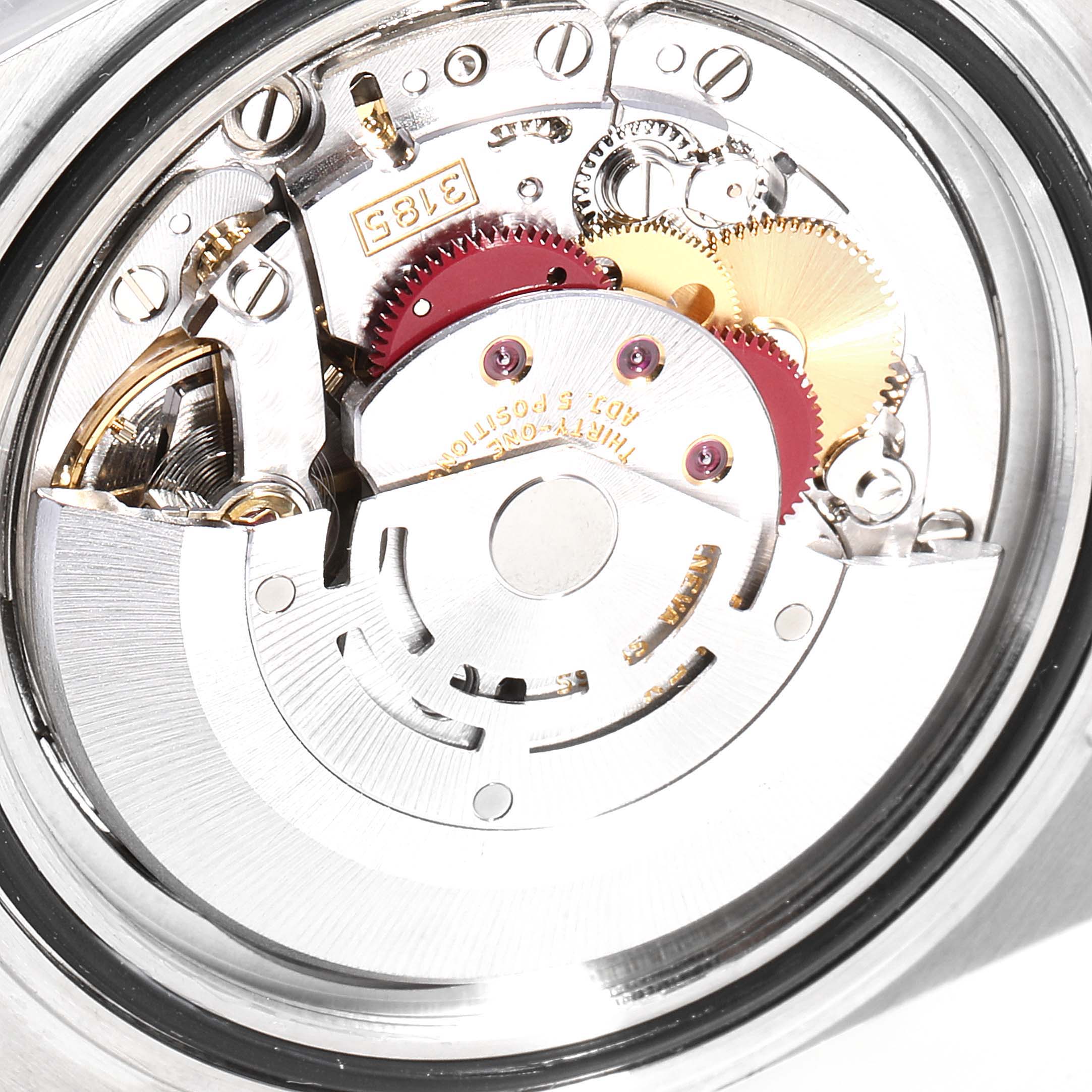 The image shows the intricate internal mechanism of the Rolex GMT-Master 16713 Men's Steel and Gold (two tone) Black Dial 16713 Men's Steel and Gold (two tone) Black Dial watch from a rear angle.