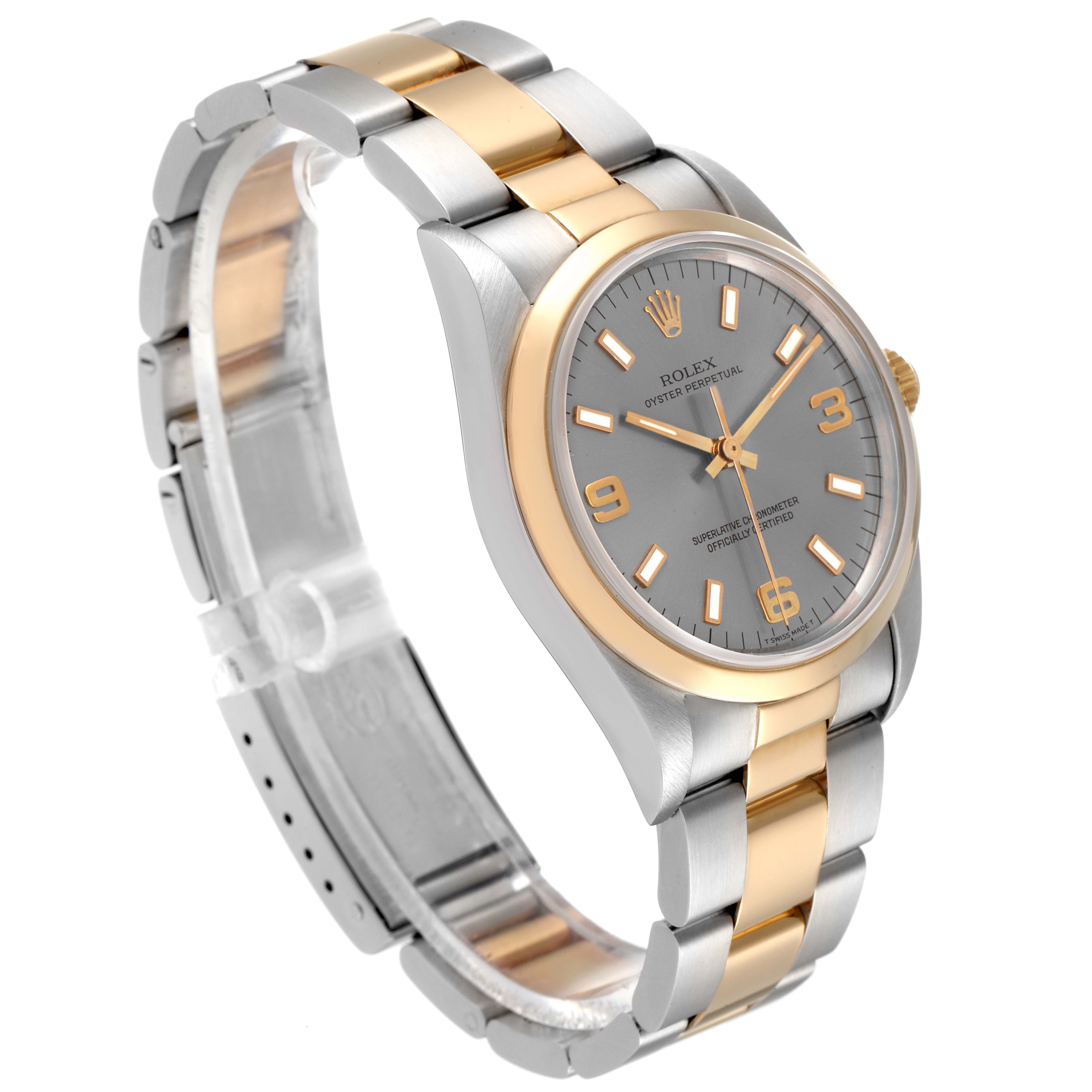 The image shows a side angle of the Rolex Oyster Perpetual 14203 Men's Steel and Gold (two tone) Grey Dial 14203 Men's Steel and Gold (two tone) Grey Dial watch highlighting the dial, bezel, and part of the bracelet.