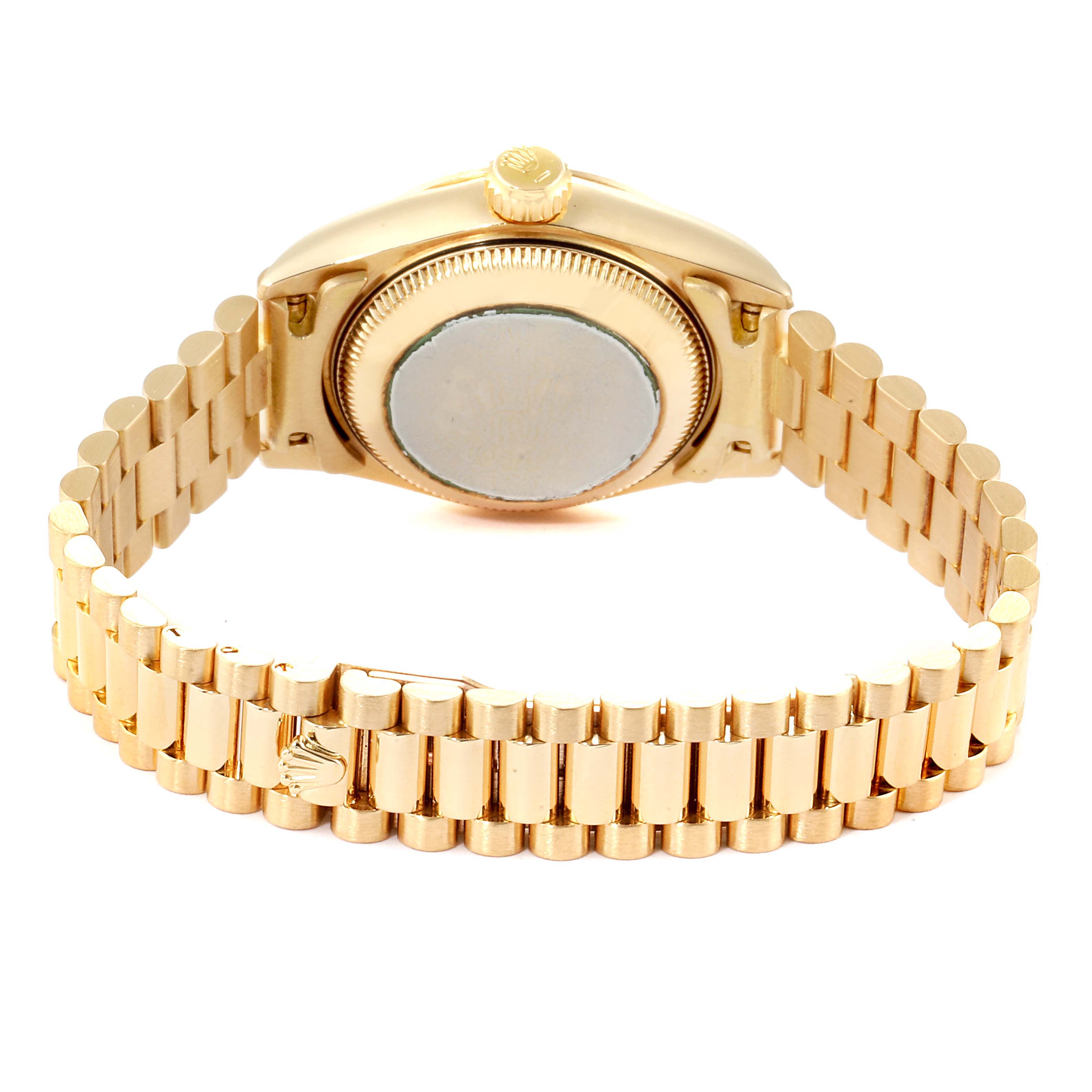 This image shows the back view of a Rolex President 69178 Women's Yellow Gold Black Dial 69178 Women's Yellow Gold Black Dial model watch, highlighting its gold case, crown, and bracelet.