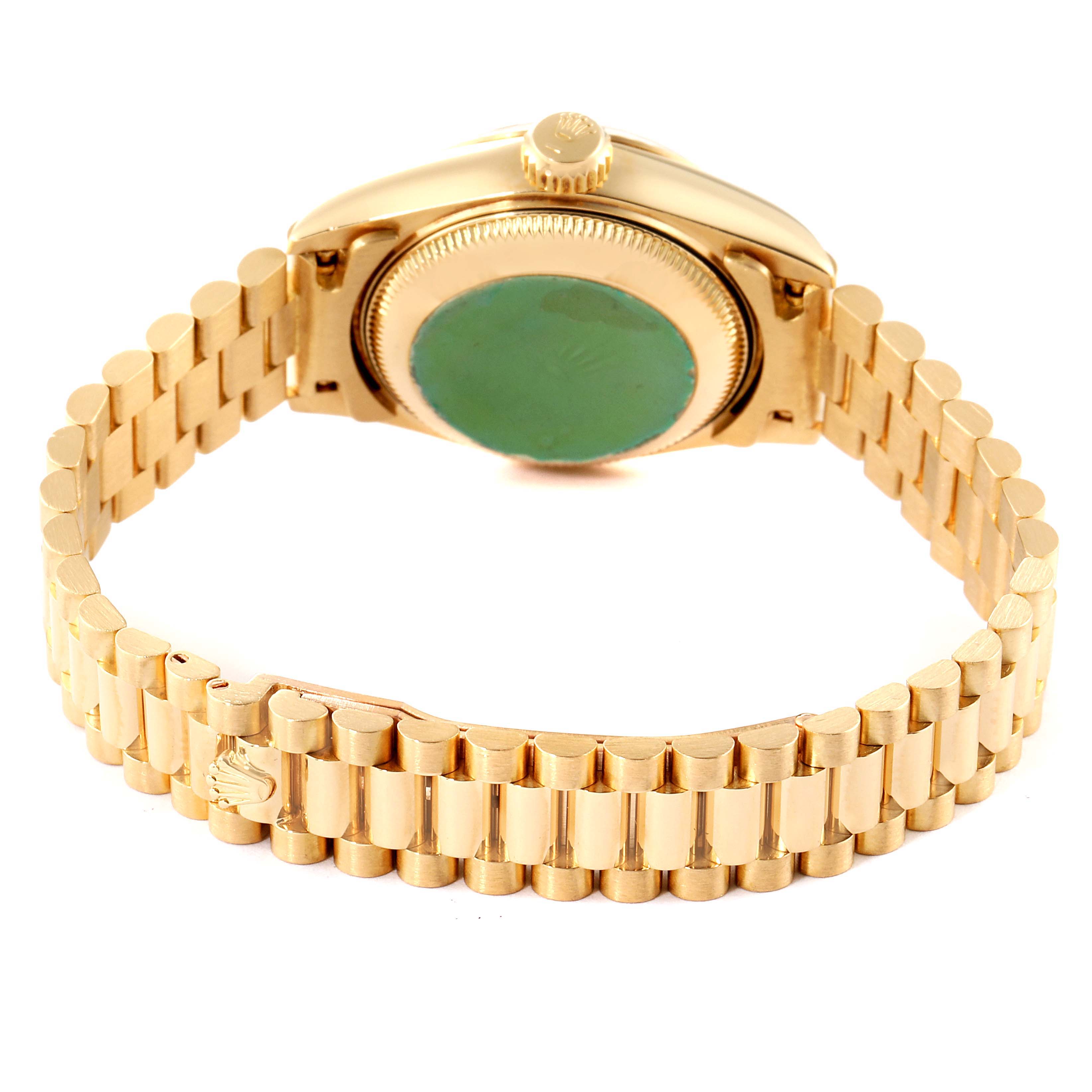 The image shows the back case and bracelet of a Rolex President 69178 Women
s Yellow Gold Champagne Dial 69178 Women
s Yellow Gold Champagne Dial model watch from a rear angle.