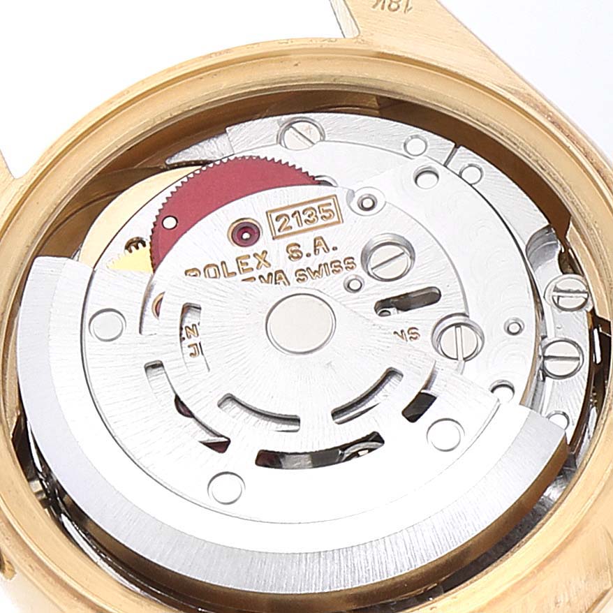 The image shows the open back view of a Rolex President 69178 Women
s Yellow Gold Champagne Dial 69178 Women
s Yellow Gold Champagne Dial watch, displaying its internal mechanism and movement parts.