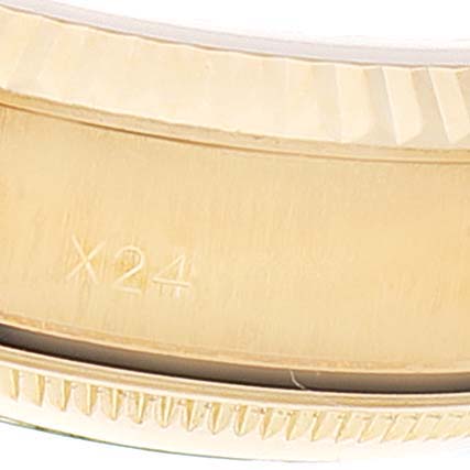 This image shows a close-up of the side edge and part of the bezel of a Rolex President 69178 Women
s Yellow Gold Champagne Dial 69178 Women
s Yellow Gold Champagne Dial model watch.