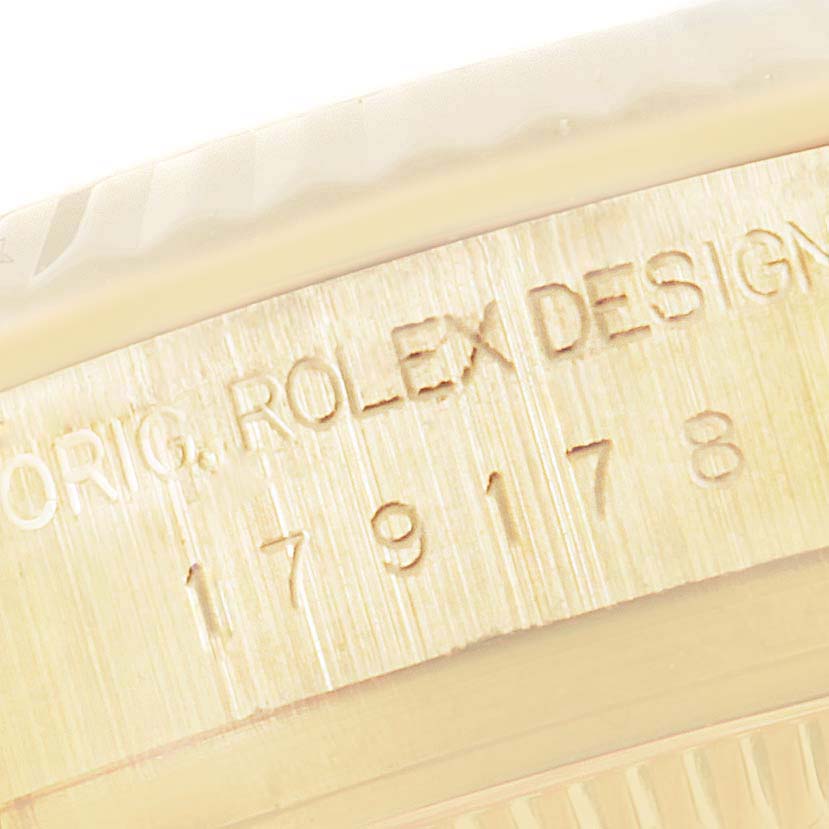 The image shows a close-up of the right side of the bezel and case, with the "ORIG. ROLEX DESIGN" inscription and model number of the Rolex President 179178 Women
s Yellow Gold Champagne Dial 179178 Women
s Yellow Gold Champagne Dial watch.