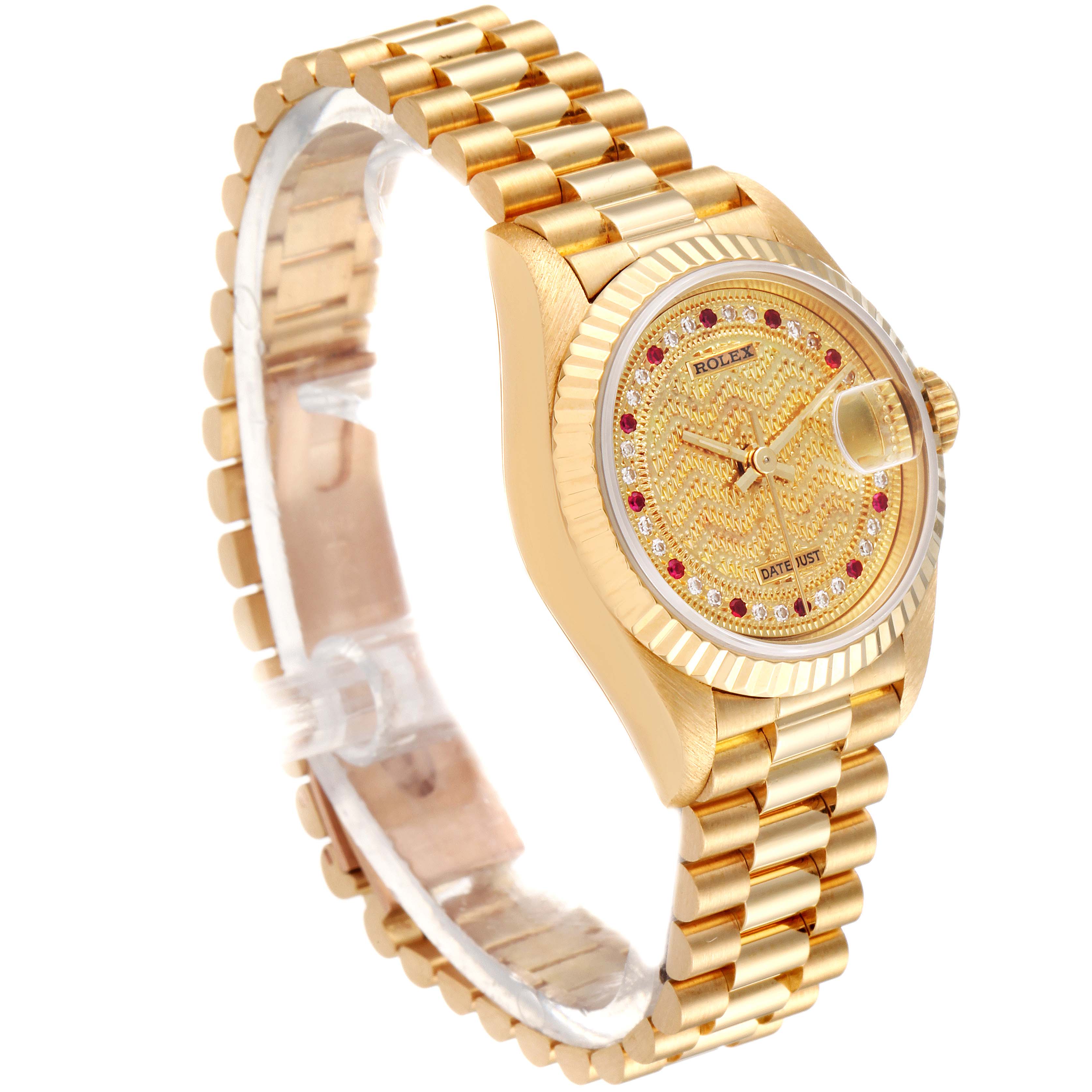This image shows a Rolex President 69178 Women's Yellow Gold Champagne Dial 69178 Women's Yellow Gold Champagne Dial model watch at a three-quarter angle, featuring its gold case, diamond and ruby-encrusted dial, and bracelet.