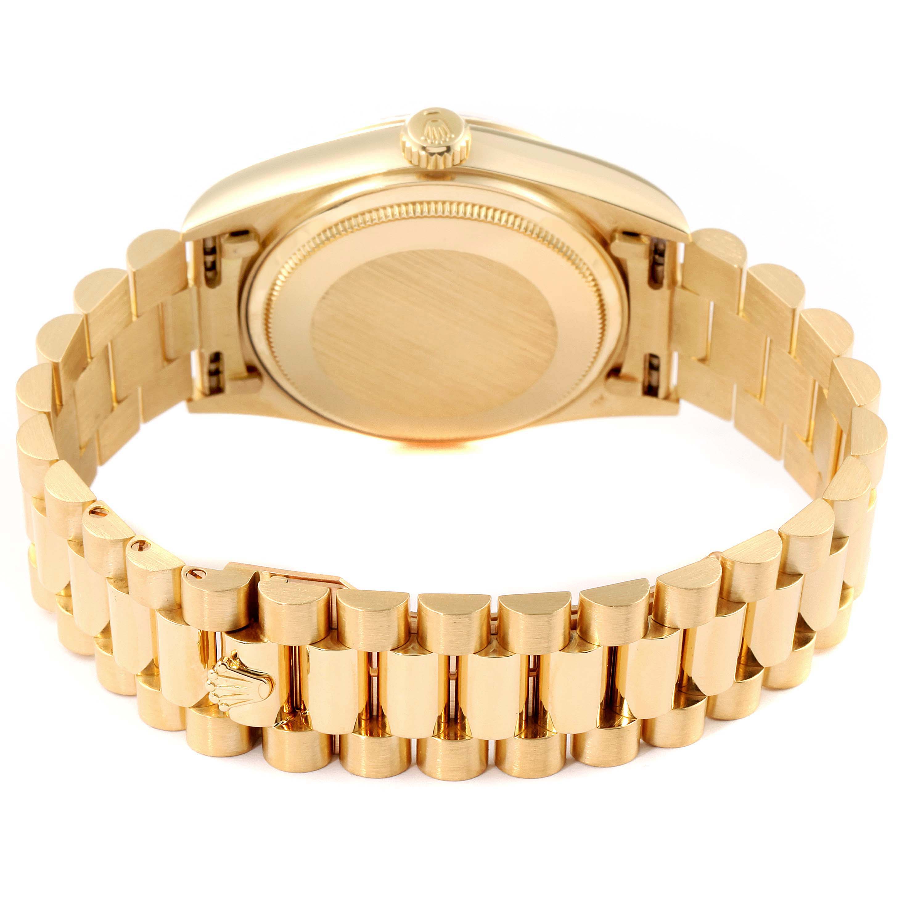 This image shows the back case and bracelet of a Rolex President 18038 Men
s Yellow Gold Champagne Dial 18038 Men
s Yellow Gold Champagne Dial model watch from a rear angle.