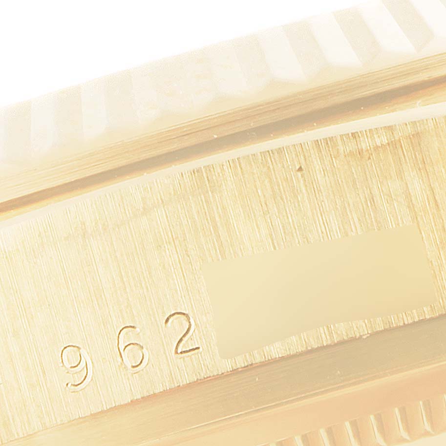 This image shows a close-up of the serial number engraved on the case of a Rolex President 18038 Men
s Yellow Gold Champagne Dial 18038 Men
s Yellow Gold Champagne Dial model watch.