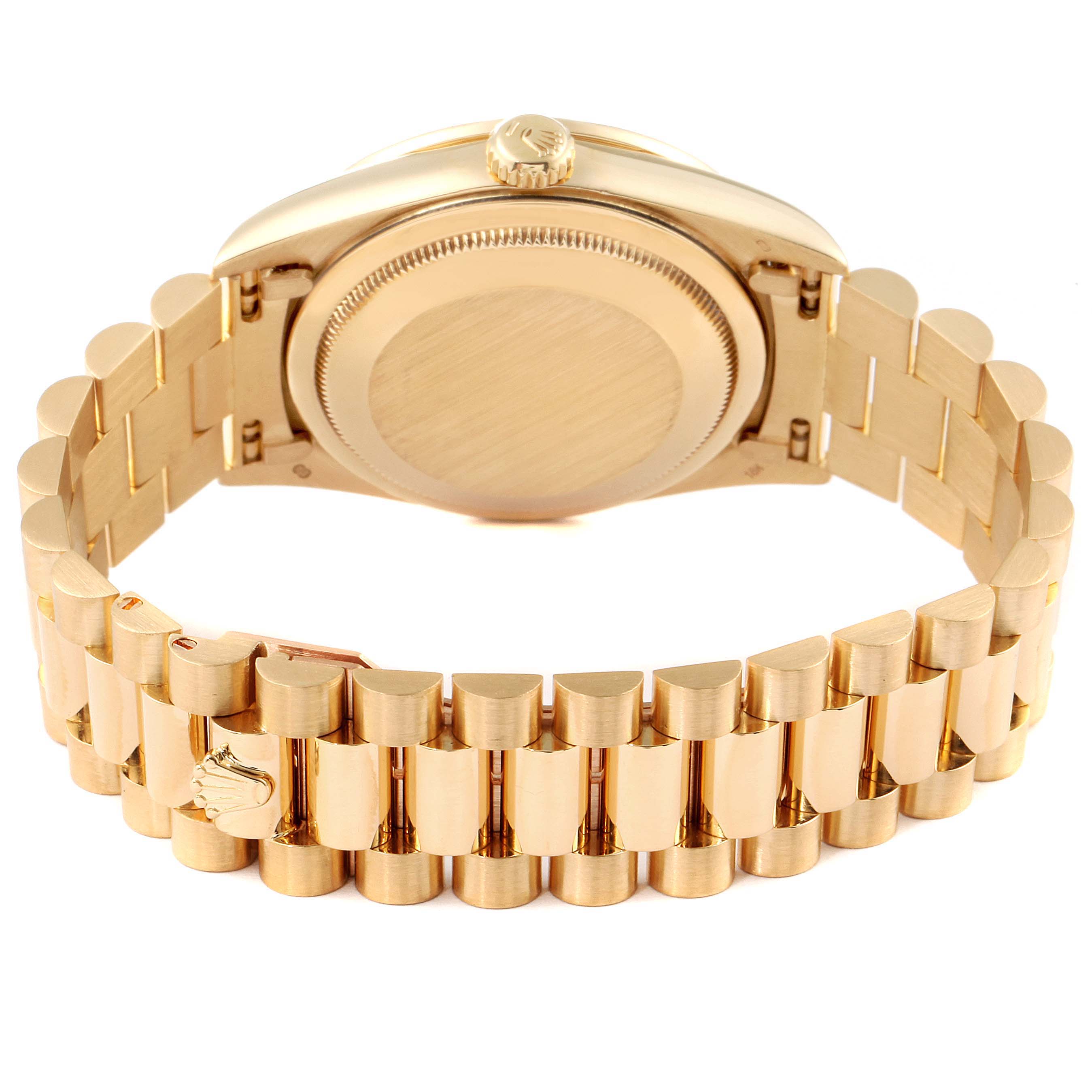 The image shows the back view of a Rolex President 18388 Men
s Yellow Gold Champagne Dial 18388 Men
s Yellow Gold Champagne Dial model watch, highlighting its gold case and bracelet.