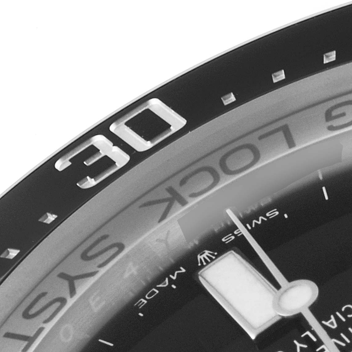 This close-up image shows the bezel with the "30" minute marker and part of the dial and hands of the Rolex Sea-Dweller 126660 Men
s Stainless Steel Blue Dial 126660 Men
s Stainless Steel Blue Dial watch.