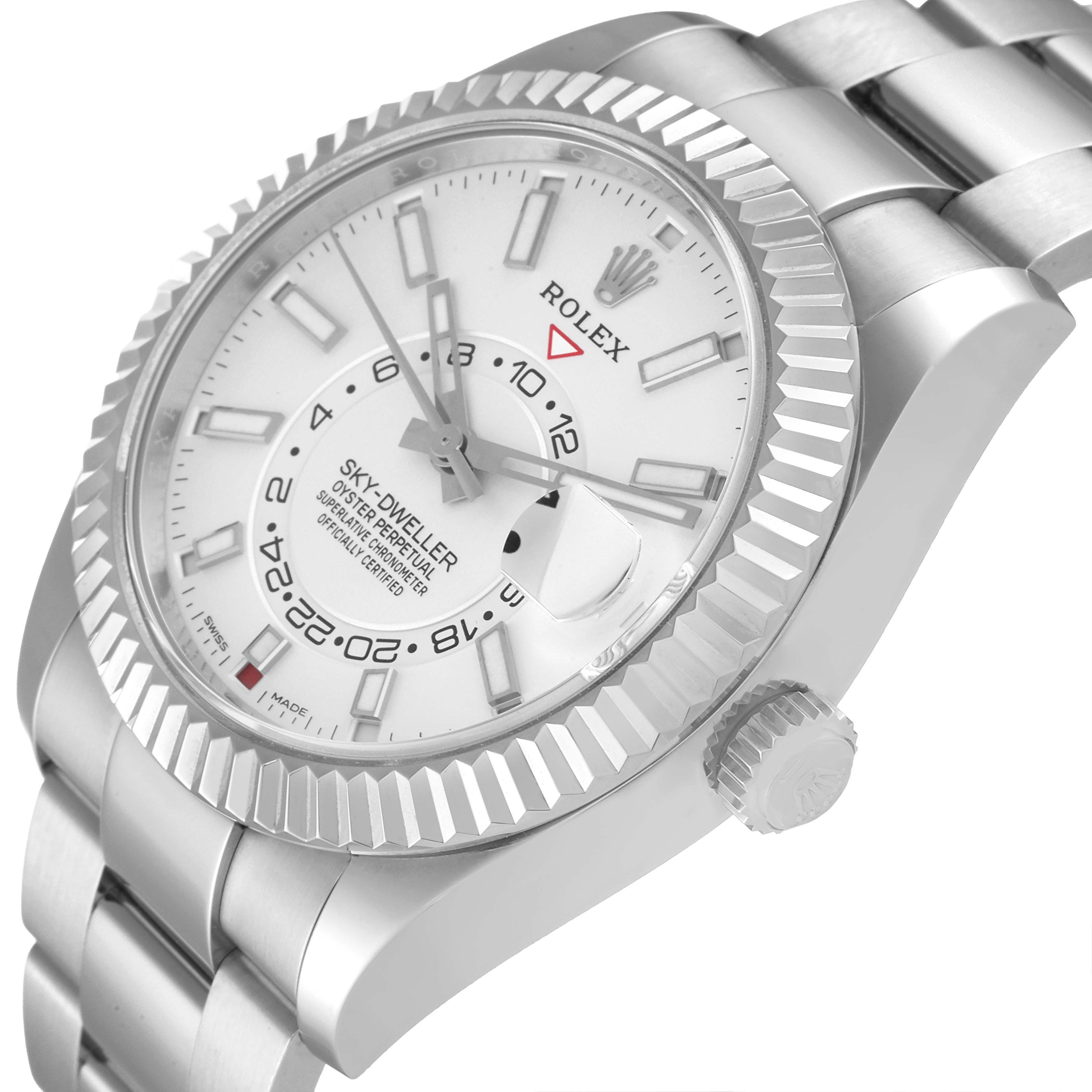 This image shows a Rolex Sky-Dweller 326934 Men's Stainless Steel White Dial 326934 Men's Stainless Steel White Dial watch at an angled close-up, highlighting the dial, bezel, and part of the bracelet.