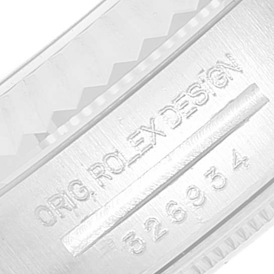 This image shows a close-up of the inner side of the bezel of a Rolex Sky-Dweller 326934 Men's Stainless Steel White Dial 326934 Men's Stainless Steel White Dial watch, displaying its reference number.