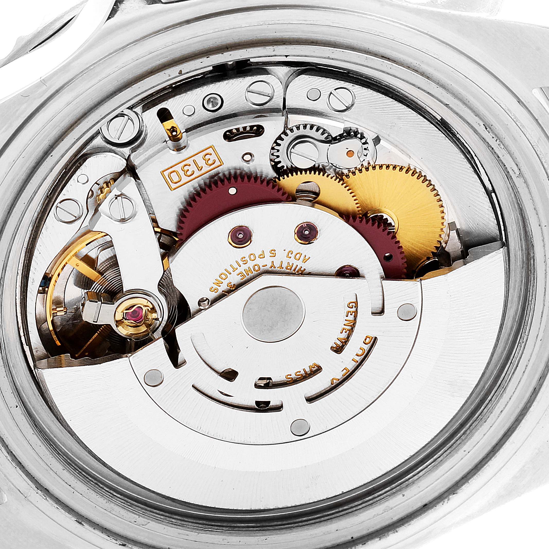 The image shows the inner mechanism and intricate components of a Rolex Submariner 14060 Men
s Stainless Steel Black Dial 14060 Men
s Stainless Steel Black Dial watch viewed from the back case.