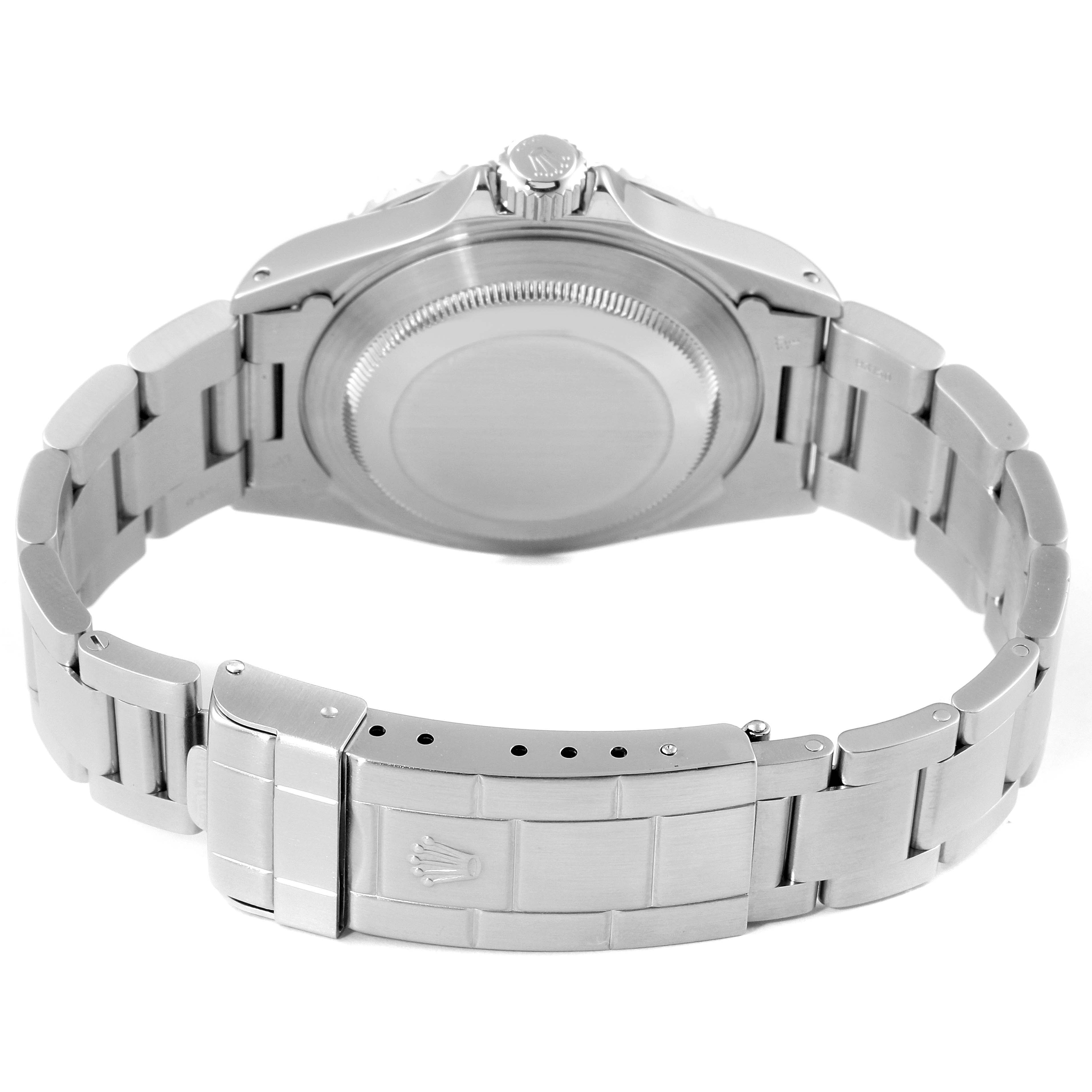 This image shows the back case and metal bracelet of a Rolex Submariner 14060 Men
s Stainless Steel Black Dial 14060 Men
s Stainless Steel Black Dial watch from a rear angle.