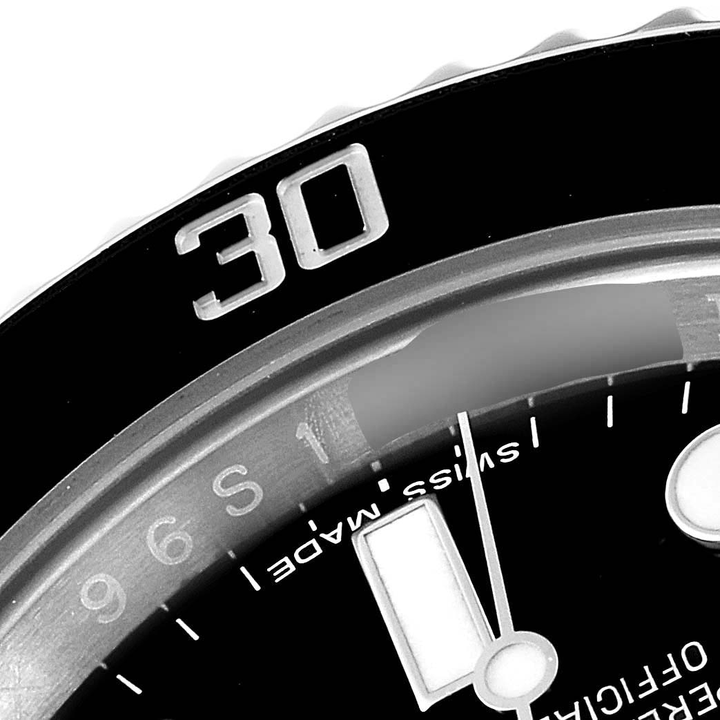 This image shows a close-up of the bezel and dial of a Rolex Submariner 116610LN Men
s Stainless Steel Black Dial 116610LN Men
s Stainless Steel Black Dial watch, focusing on the "30" marker and "Swiss Made" text.