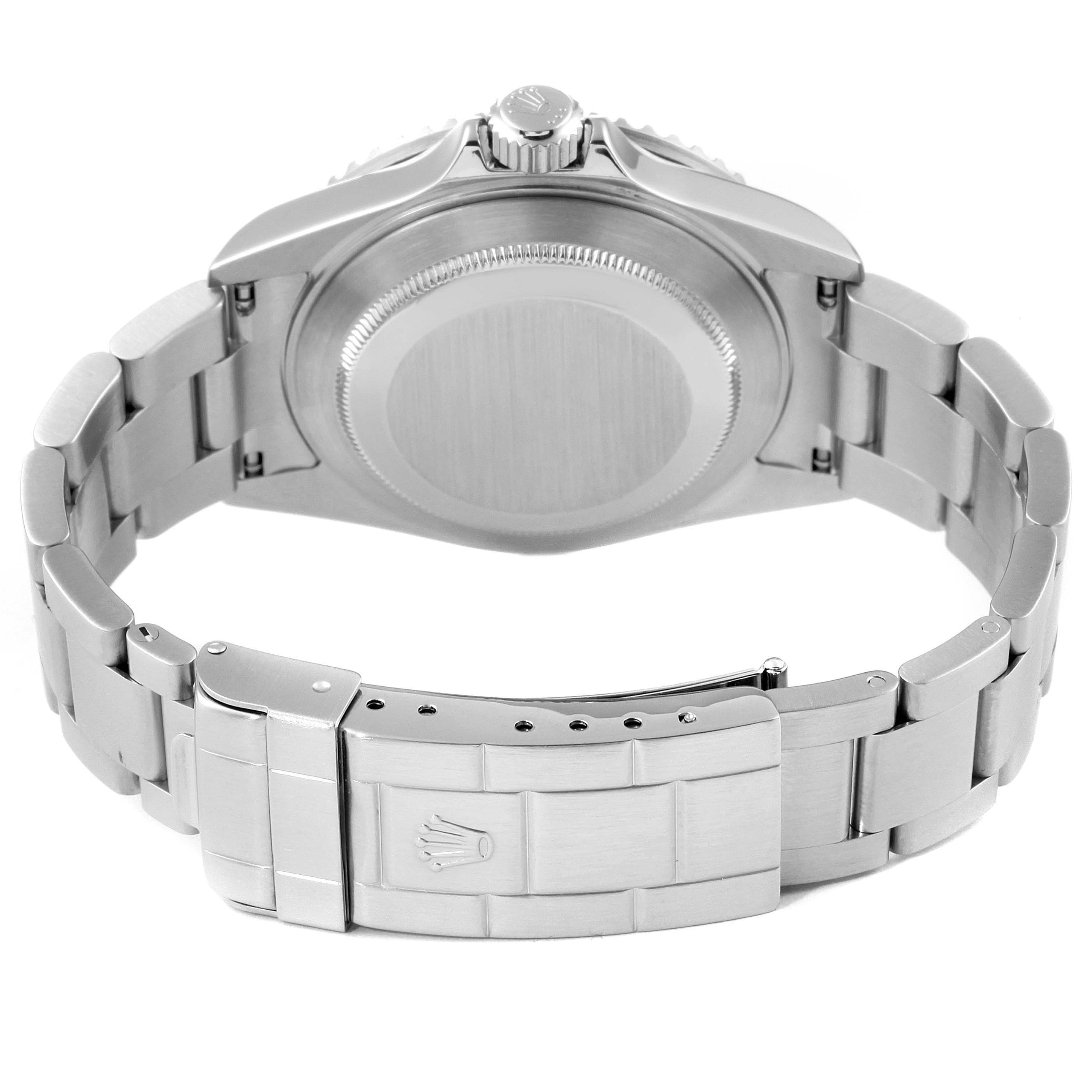 The image shows the back view of a Rolex Submariner 16610 Men
s Stainless Steel Black Dial 16610 Men
s Stainless Steel Black Dial watch, highlighting the case back, bracelet, and clasp.