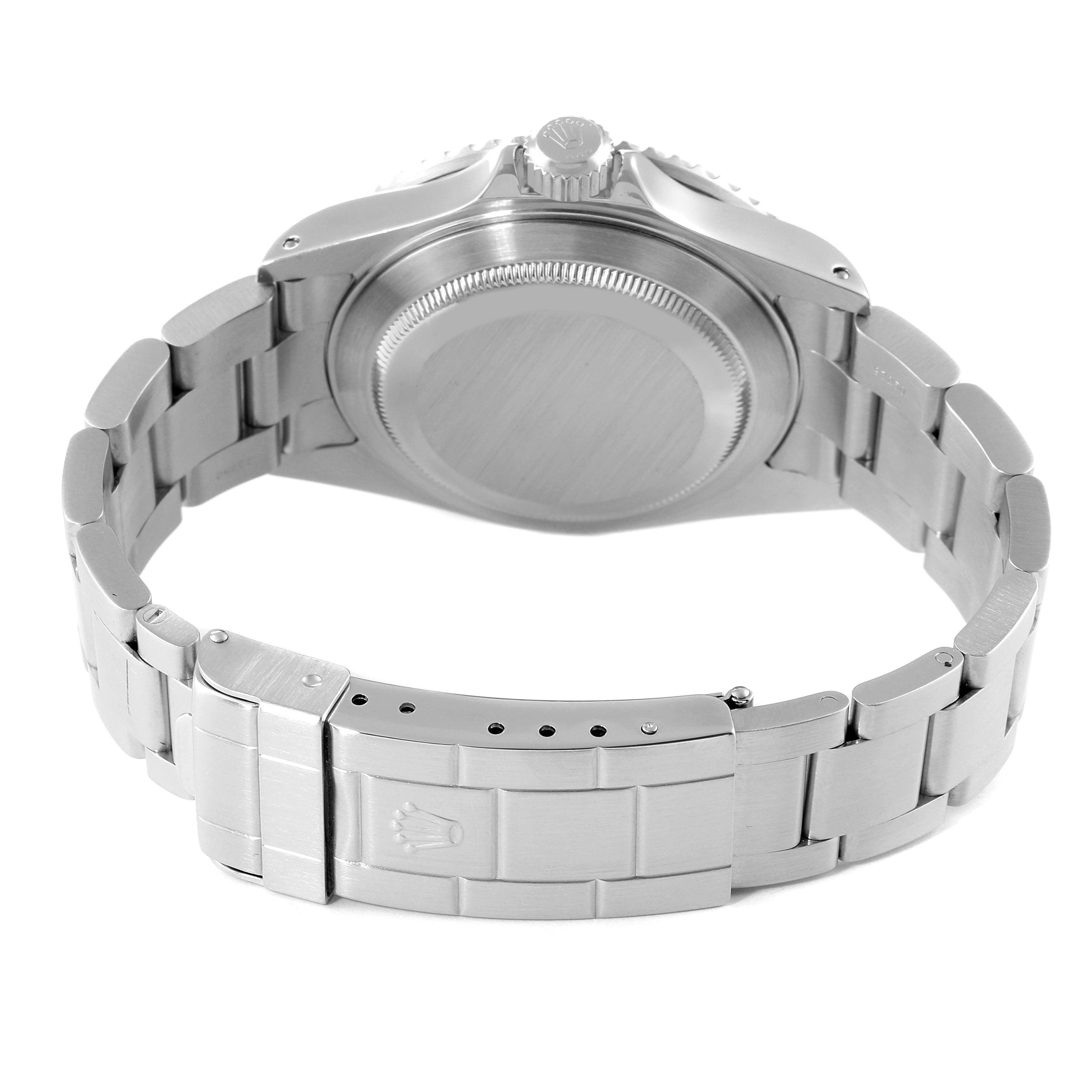 This image shows the back view of a Rolex Submariner 16610 Men
s Stainless Steel Black Dial 16610 Men
s Stainless Steel Black Dial watch, highlighting the case back and bracelet clasp.