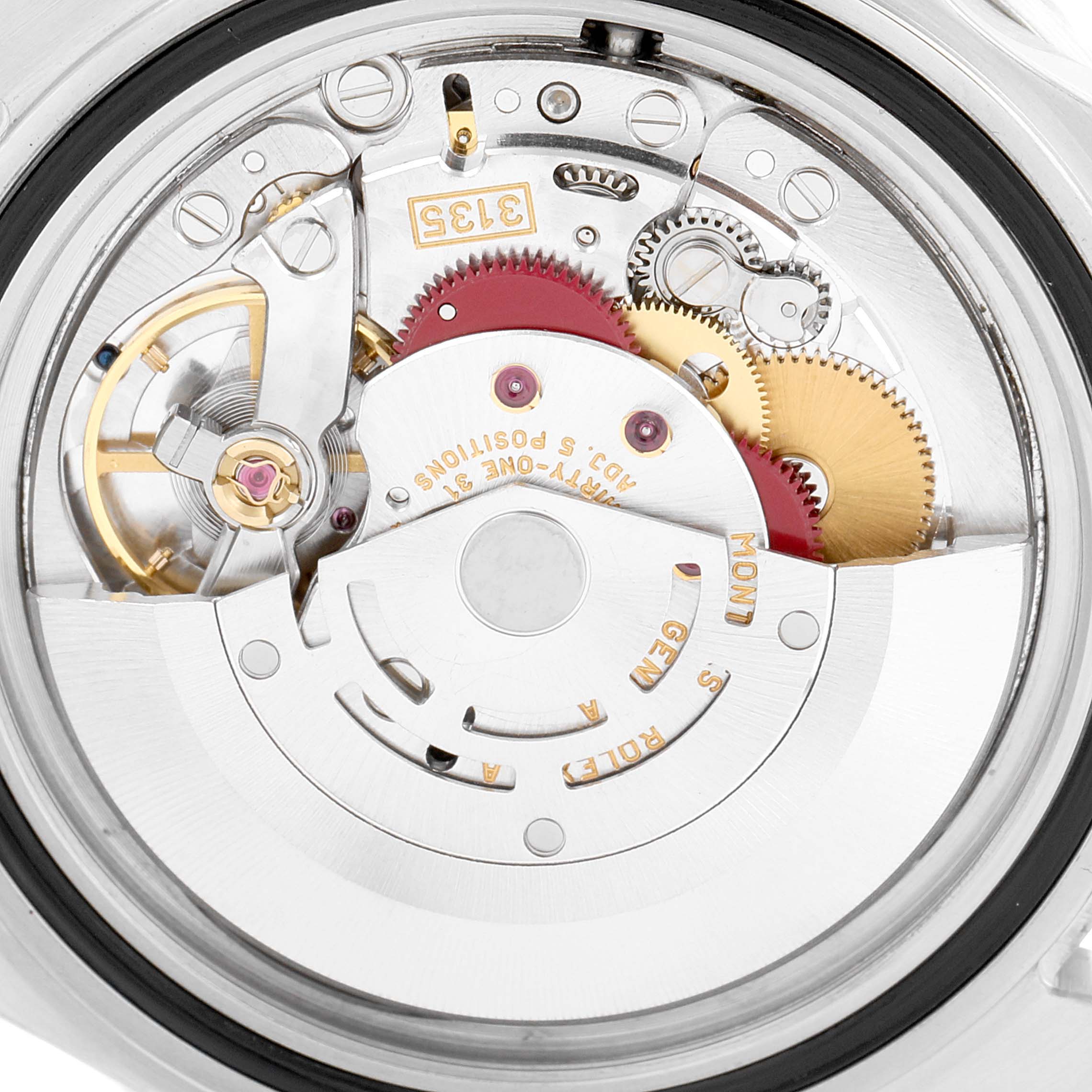 This image shows the intricate movements and internal components of the Rolex Submariner 16610 Men
s Stainless Steel Black Dial 16610 Men
s Stainless Steel Black Dial watch from a top-down angle.