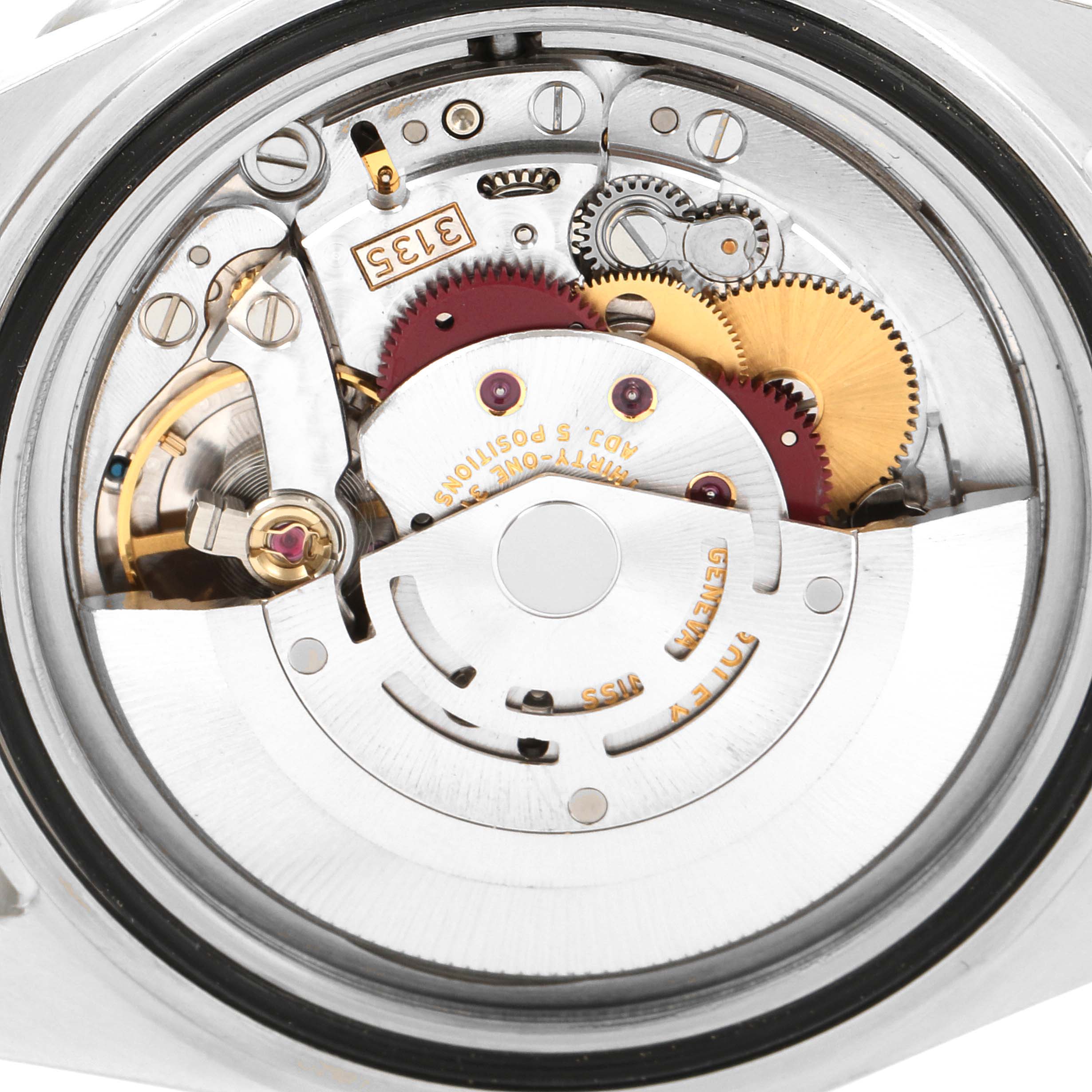 This image shows the internal mechanical movement of a Rolex Submariner 16610 Men
s Stainless Steel Black Dial 16610 Men
s Stainless Steel Black Dial watch from a back angle.