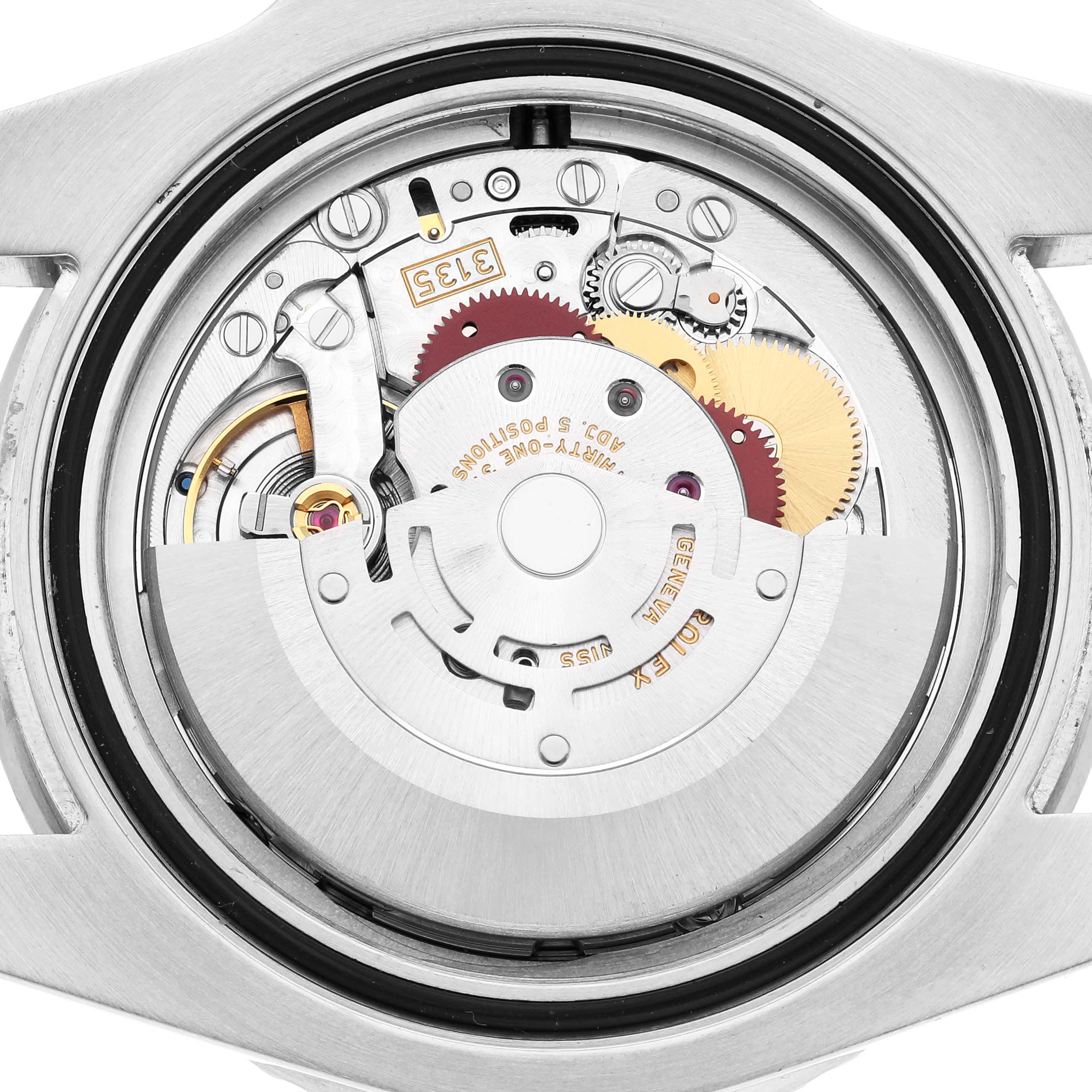 The image shows the movement of a Rolex Submariner 116610 Men's Stainless Steel Black Dial 116610 Men's Stainless Steel Black Dial from the back, highlighting its intricate mechanical components.