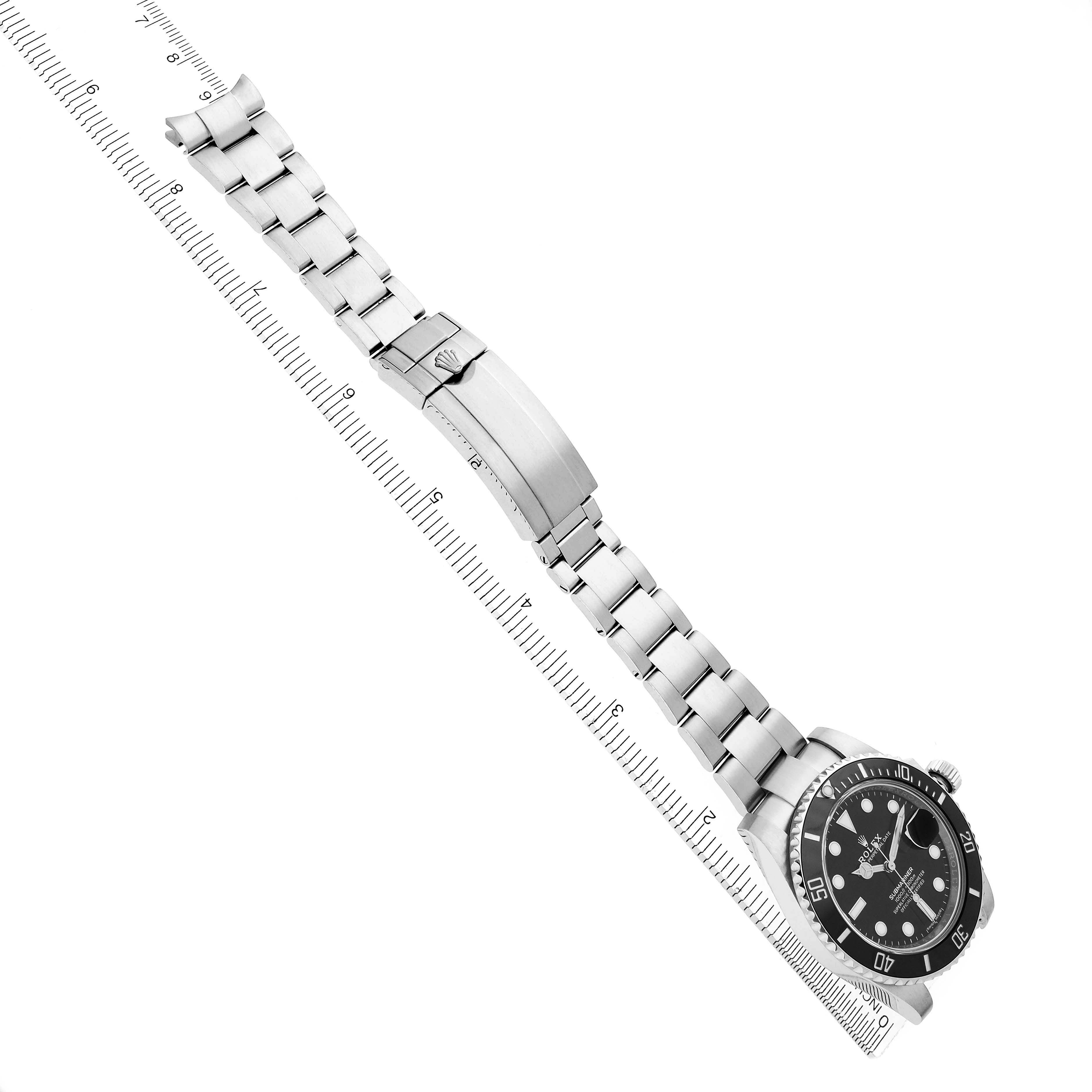 The Rolex Submariner 116610 Men's Stainless Steel Black Dial 116610 Men's Stainless Steel Black Dial watch is shown from an overhead angle, displaying the full bracelet and clasp.