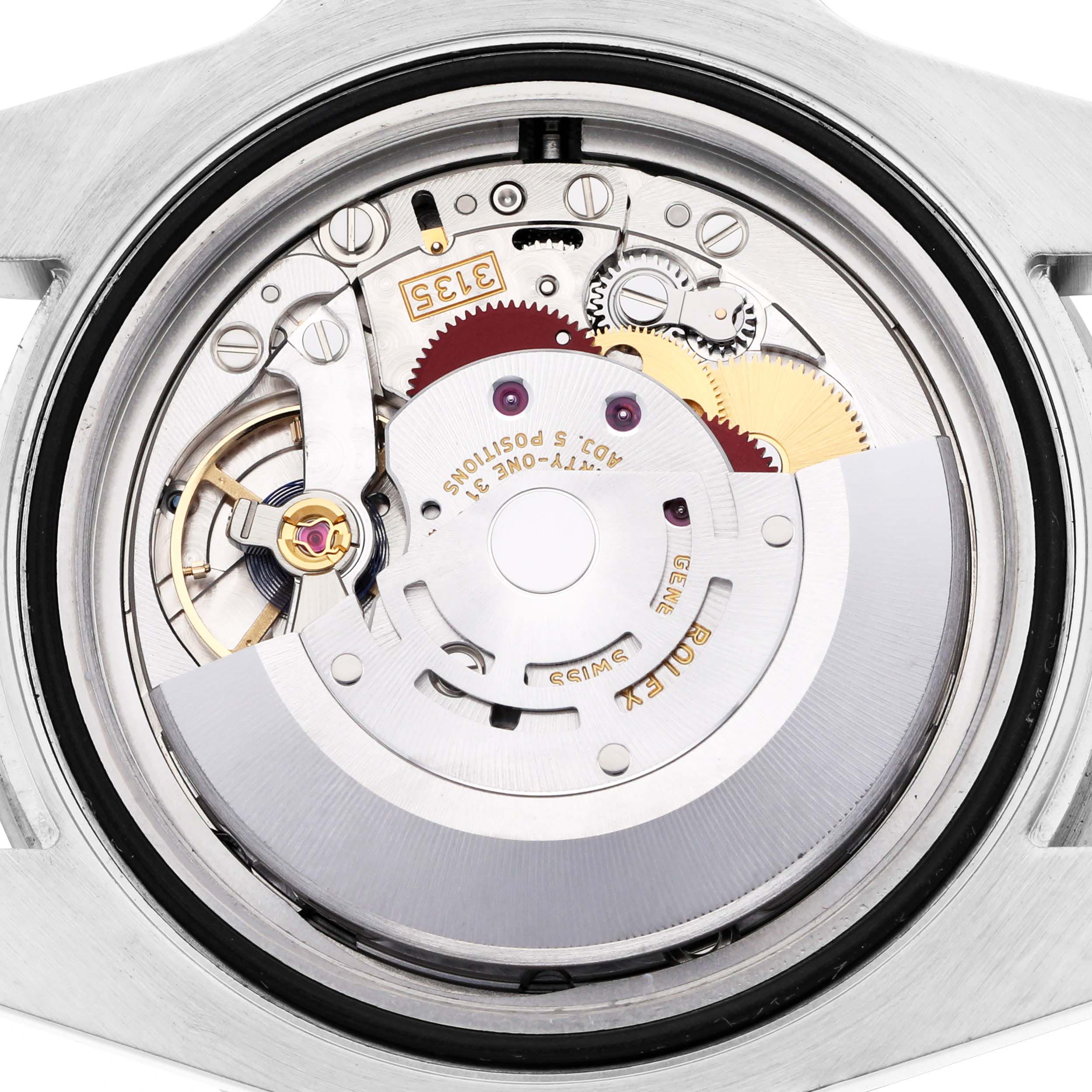 The image shows the movement of a Rolex Submariner 116610 Men's Stainless Steel Black Dial 116610 Men's Stainless Steel Black Dial watch viewed from the back, highlighting its intricate components.