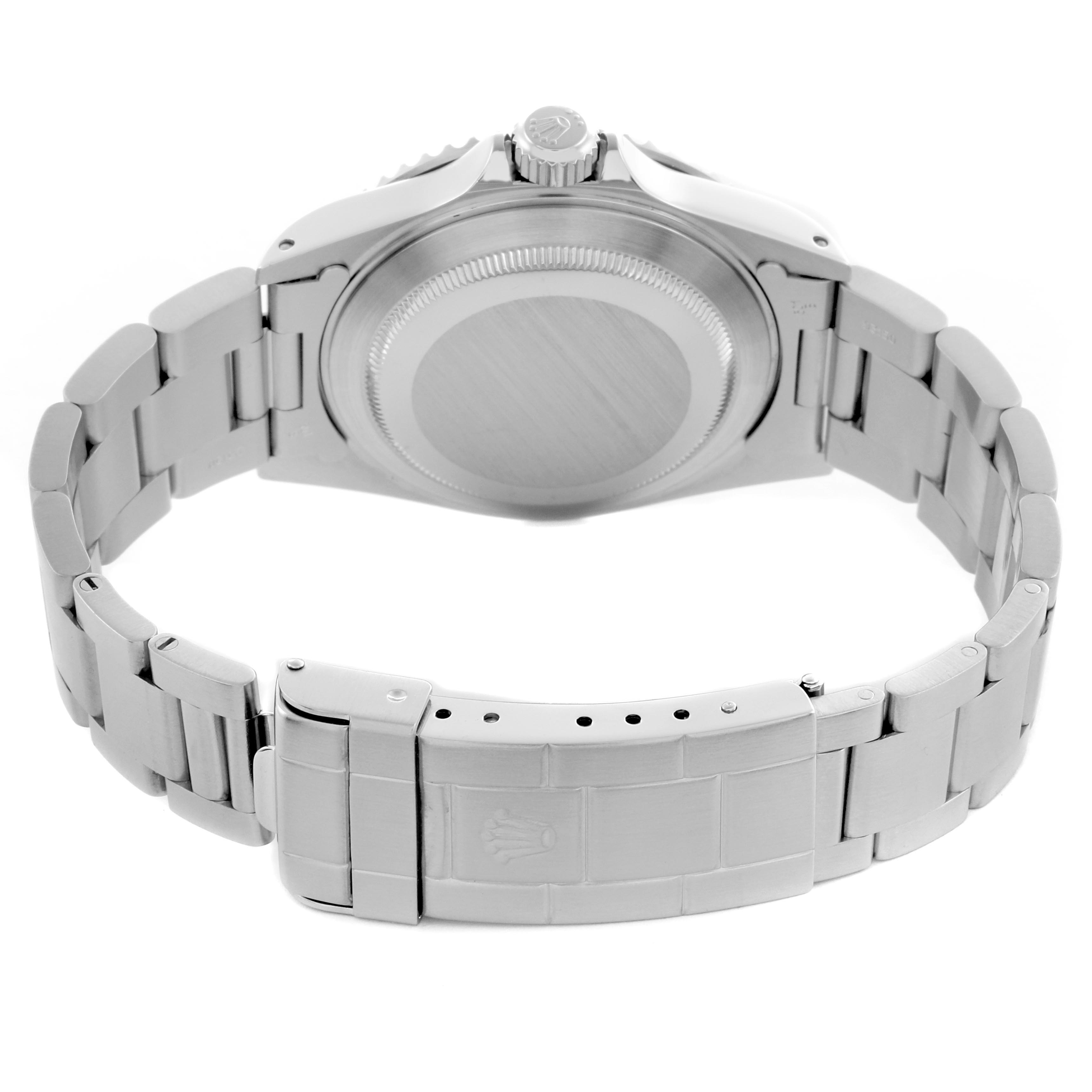 The image shows the Rolex Submariner 14060 Men's Stainless Steel Black Dial 14060 Men's Stainless Steel Black Dial's back, bracelet, and clasp from a rear angle.