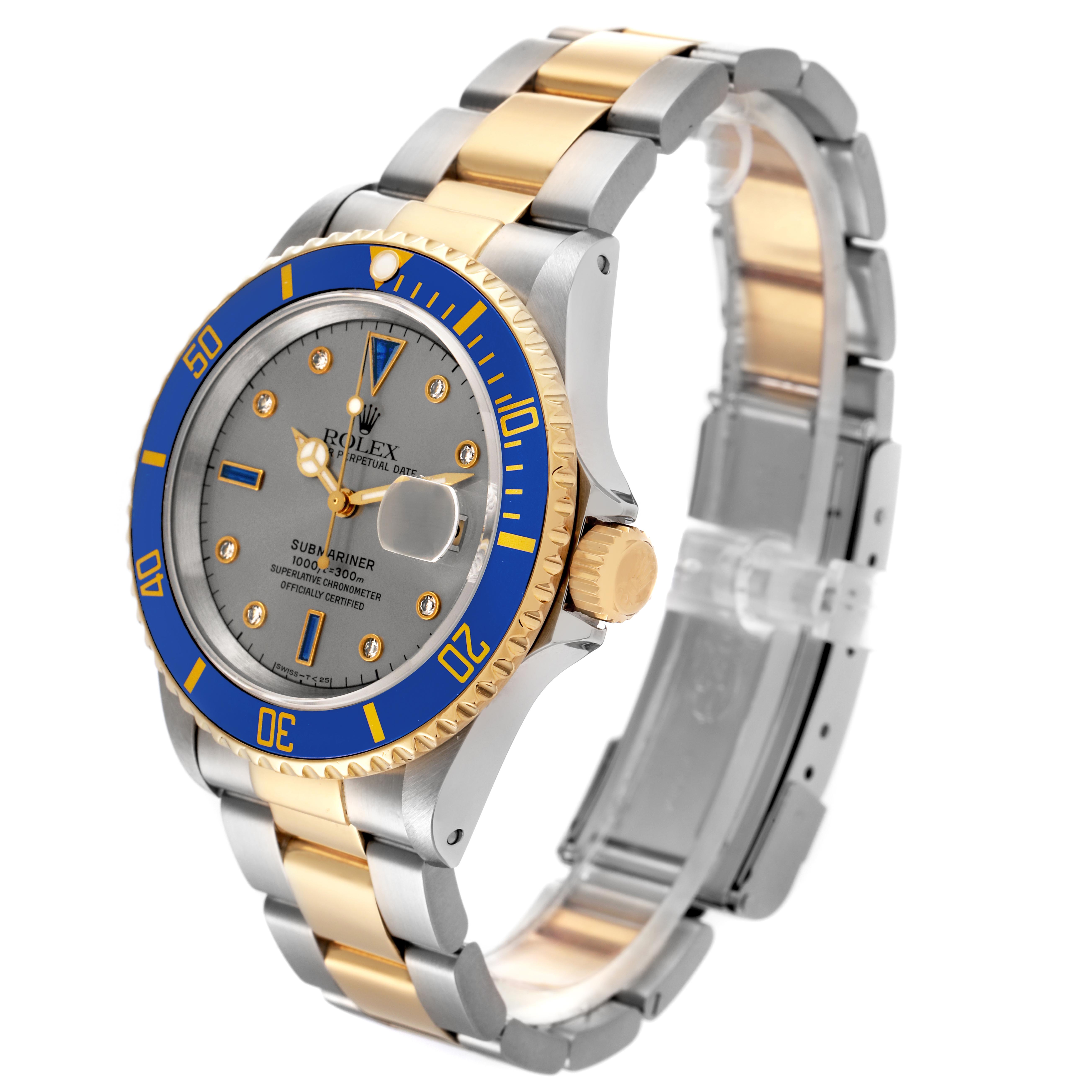 The Rolex Submariner 16613 Men
s Steel and Gold (two tone) Silver Dial 16613 Men
s Steel and Gold (two tone) Silver Dial is shown at a three-quarter angle, highlighting the bezel, dial, crown, and band.