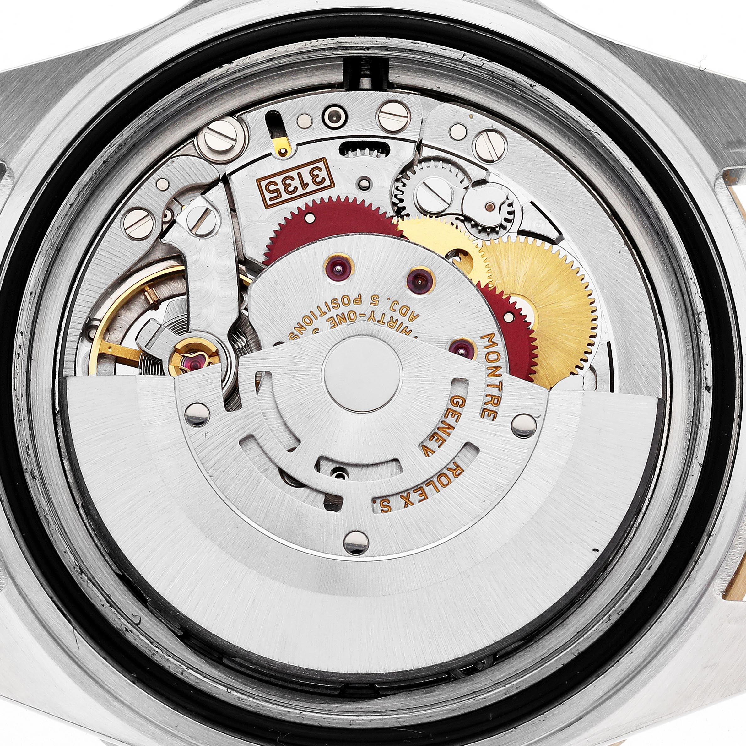 The image shows a close-up of the Rolex Submariner 16613 Men
s Steel and Gold (two tone) Silver Dial 16613 Men
s Steel and Gold (two tone) Silver Dial
s movement from the back, highlighting gears and the rotor mechanism.