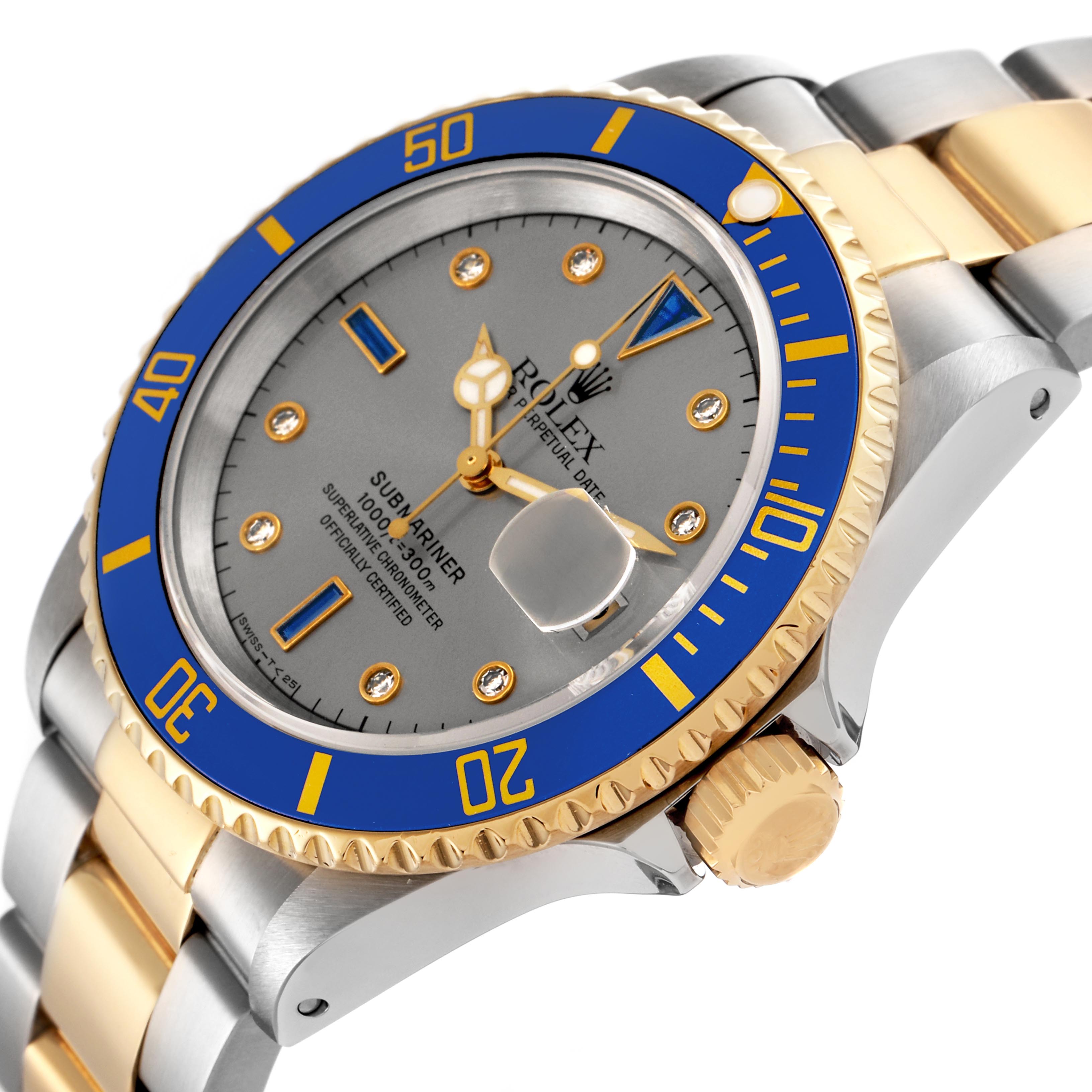 The Rolex Submariner 16613 Men
s Steel and Gold (two tone) Silver Dial 16613 Men
s Steel and Gold (two tone) Silver Dial watch is shown at an angle highlighting the bezel, crown, and bracelet.