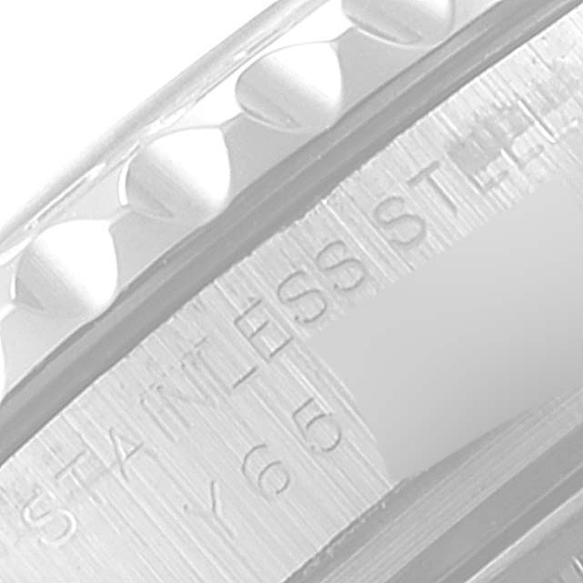 The image shows a close-up of the stainless steel bezel and case edge of a Rolex Yacht-Master 169622 Women
s Stainless Steel Silver Dial 169622 Women
s Stainless Steel Silver Dial watch.