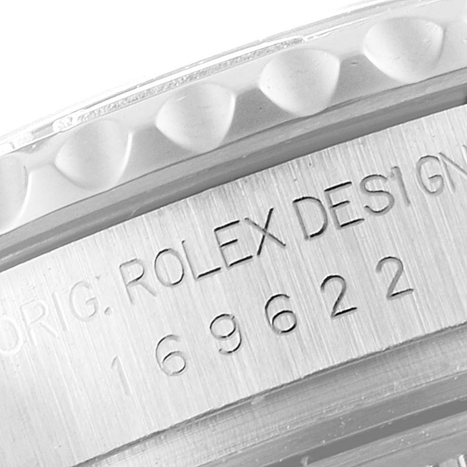The image shows a close-up of the Rolex Yacht-Master 169622 Women's Stainless Steel Silver Dial 169622 Women's Stainless Steel Silver Dial model's bezel and engraved model number.